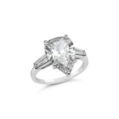 GIA Certified 4.04 Carats Pear Shape Diamond Three-Stone Engagement Ring