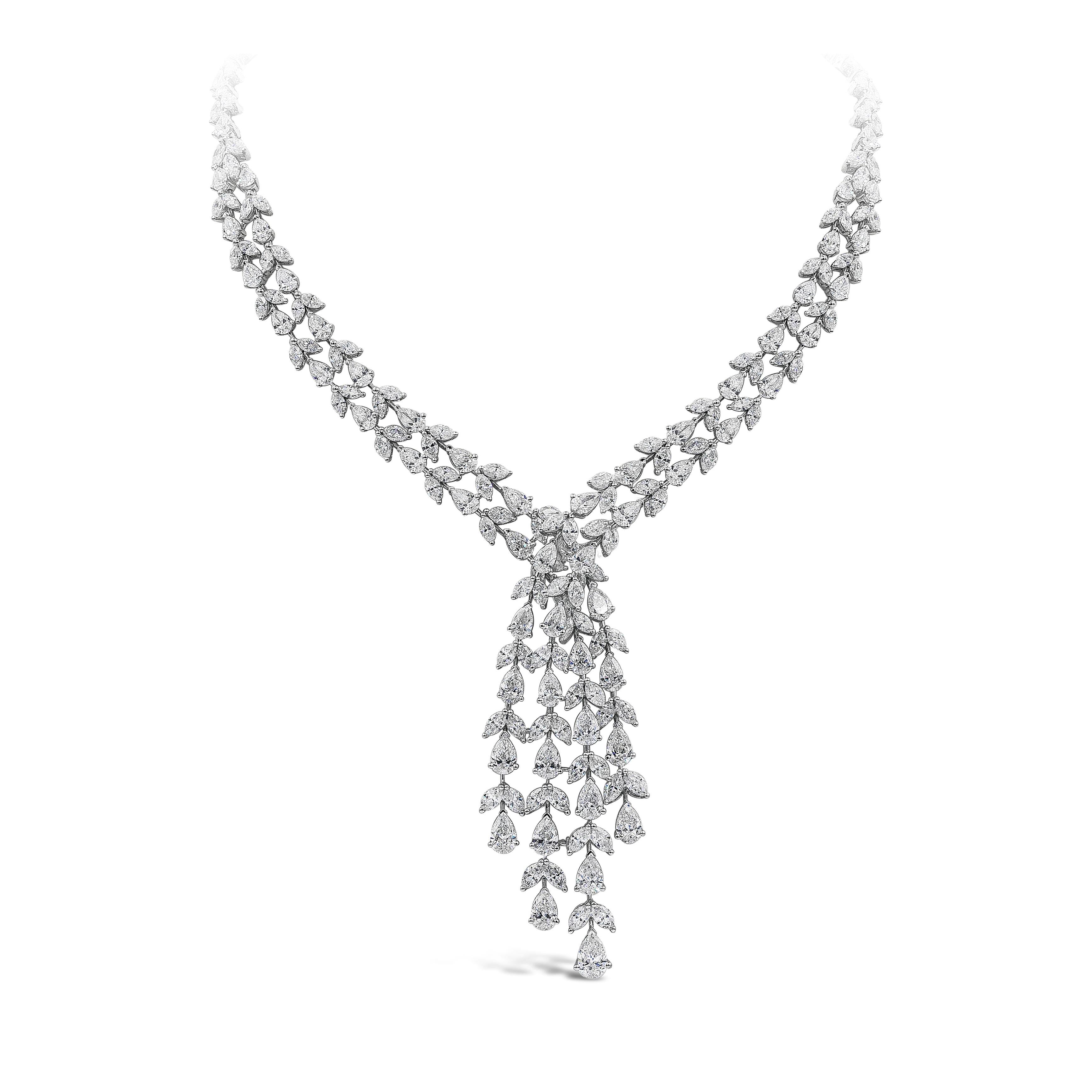 An important and luxurious necklace showcasing pear and marquise cut diamonds, set in an intricate and elegant open-work design. Diamonds weigh 40.94 carats total. Made in 18 karat white gold. 

