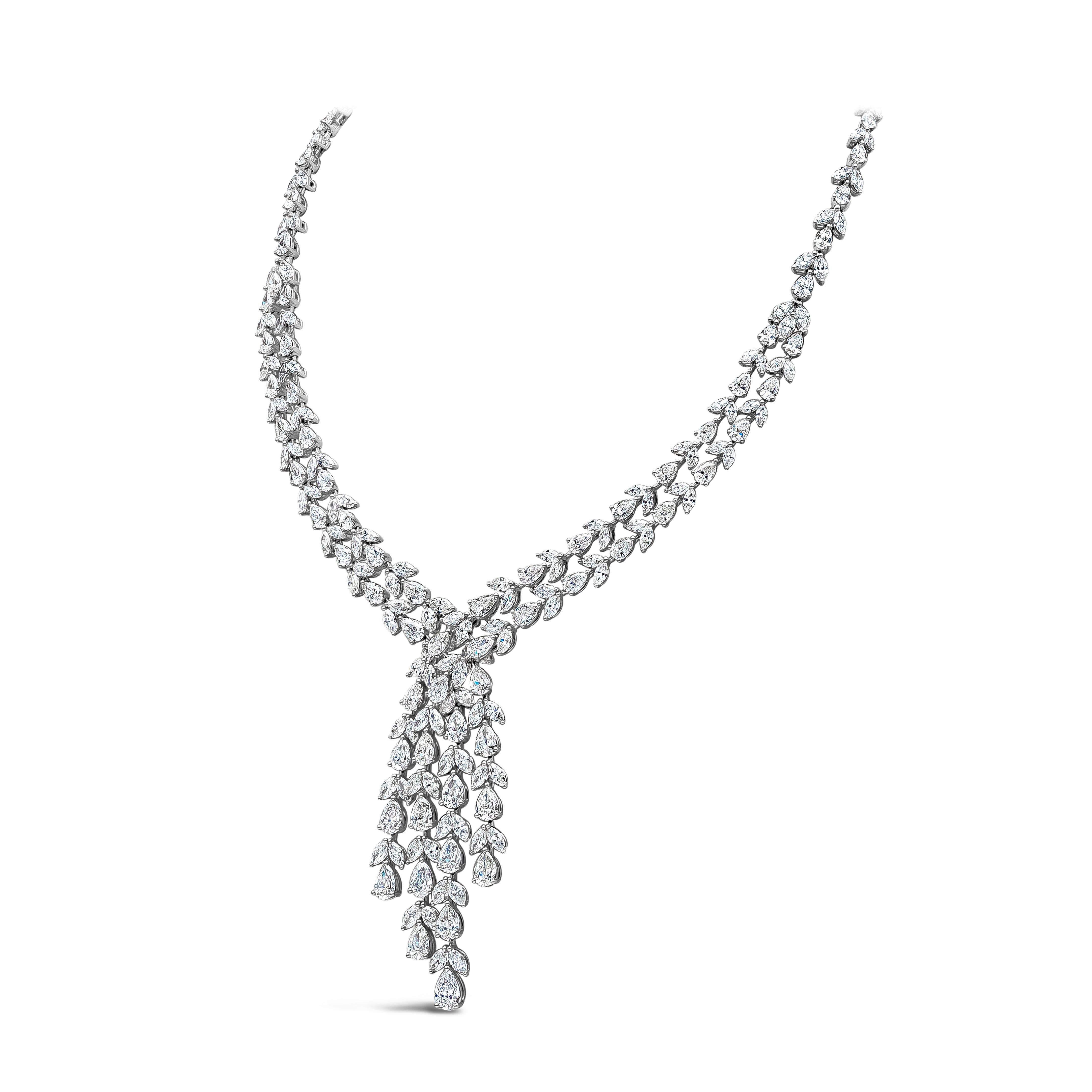 An elegant and well-crafted high end necklace, showcasing a cluster of mixed pear and marquise cut diamonds weighing 41.21 carats total with D-G color and VS-SI clarity. Made with 18K white gold. Perfect necklace to wear at galas and other luxurious