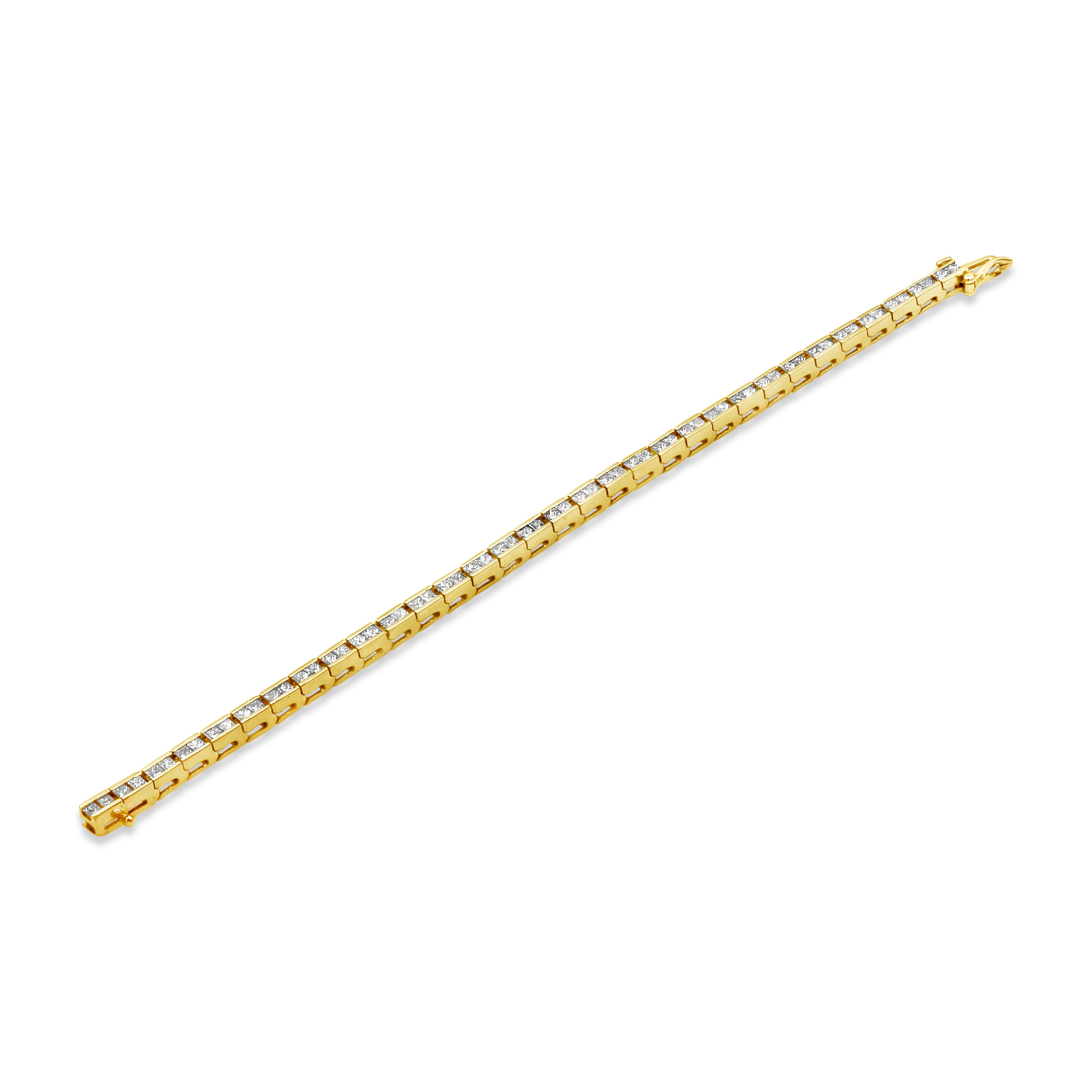 This classic tennis bracelet showcases 64 princess cut diamonds weighing a total of 4.30 carats. Mounted in a channel setting and made in 14K Yellow Gold, 7 inches in Length.

Roman Malakov is a custom house, specializing in creating anything you