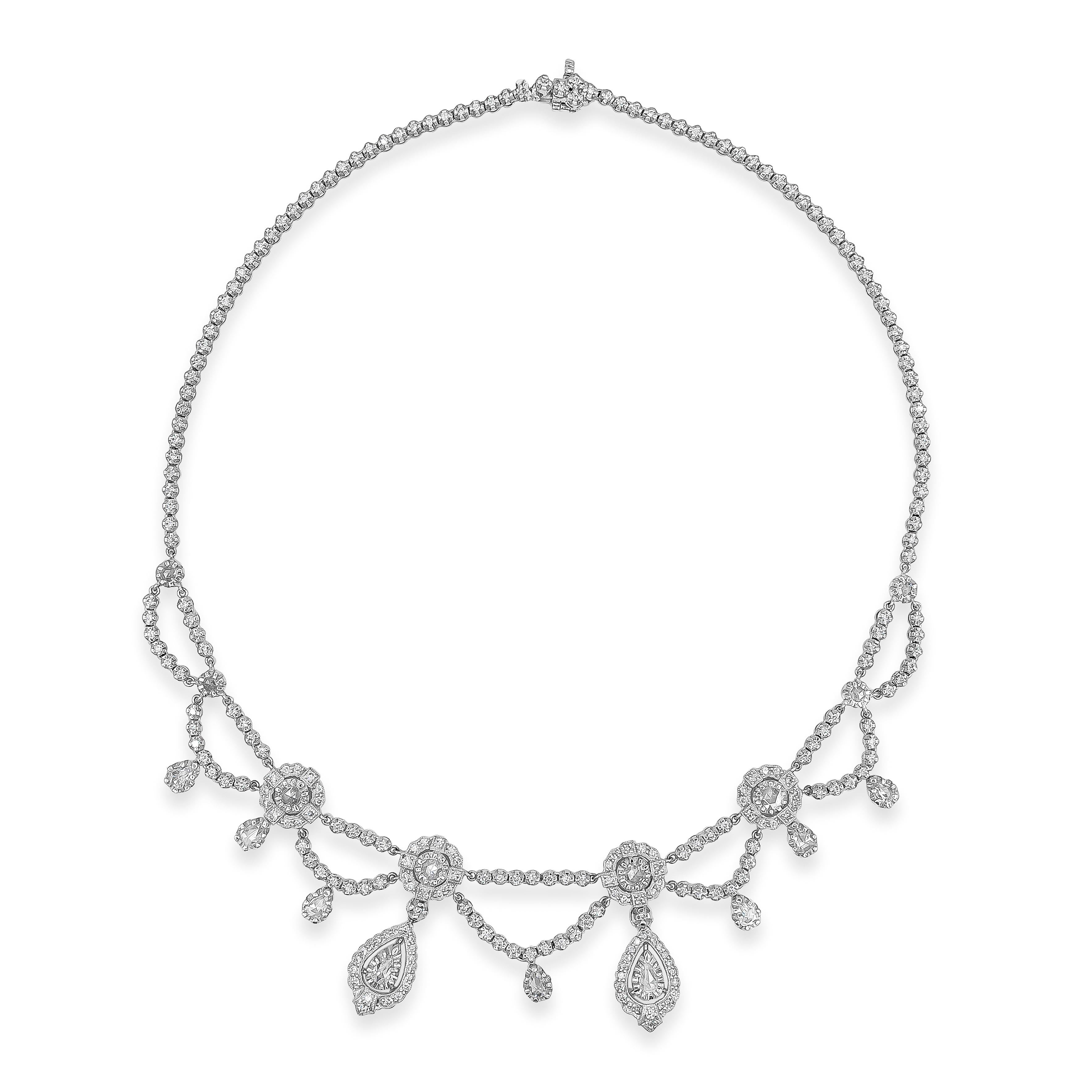 Ce collier de diamants ancien et élégant présente 4,33 carats de diamants ronds taillés en rose et de diamants ronds brillants. Elegantly set in a curtain antique design. Fabriqué en or blanc 18 carats. 

Roman Malakov est une maison sur mesure,