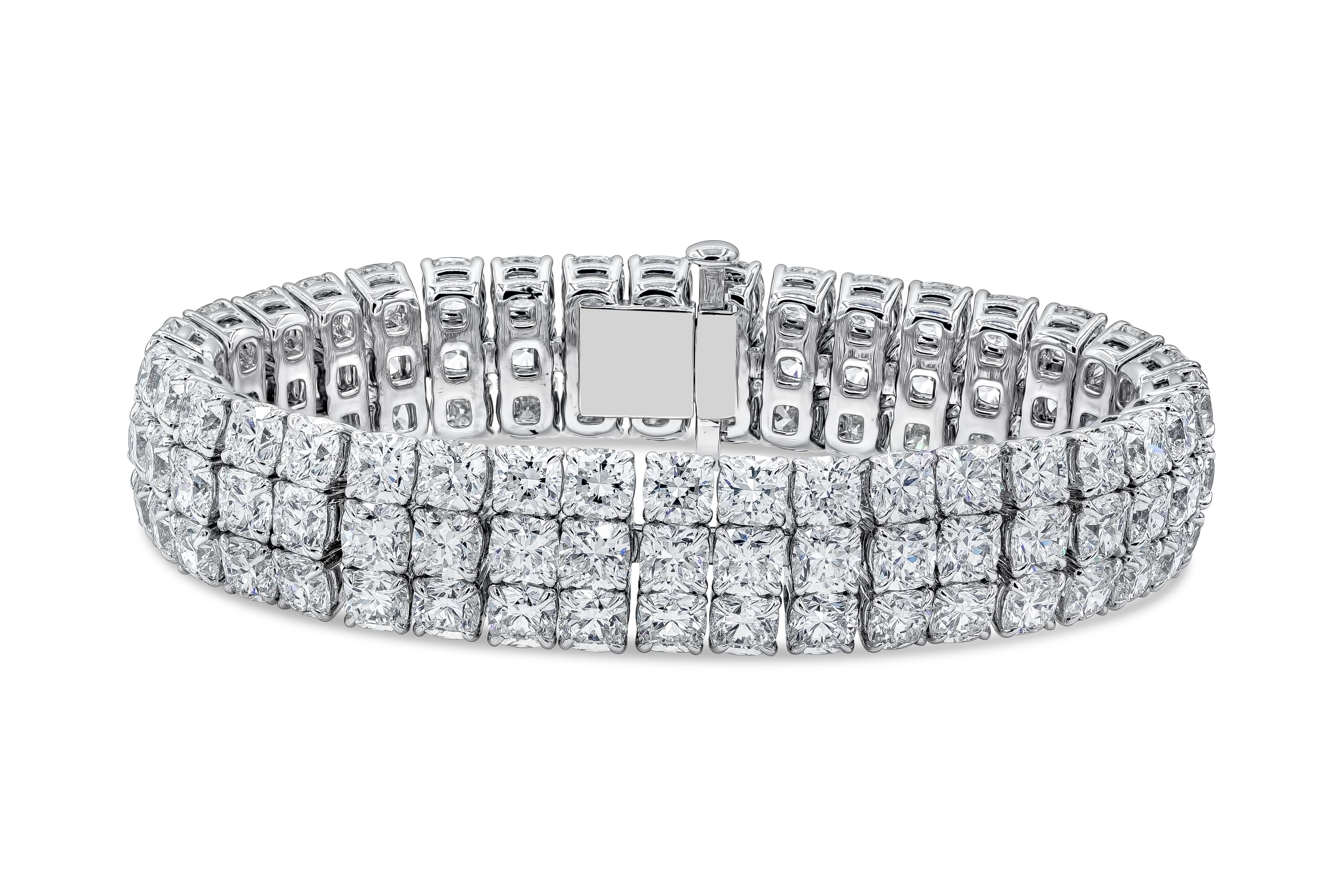 This elegant and luxurious tennis bracelet featuring 108 stones of brilliant cushion cut diamonds weighing an astounding 44.30 carats total, F+ color and VS+ in clarity. All stones are very white and perfectly matched. Set in a three-row 18k white