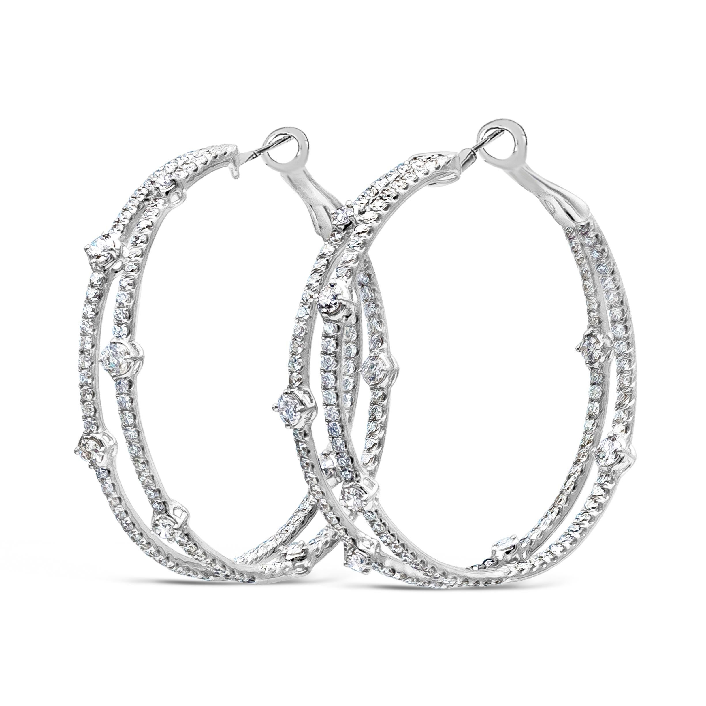 A unique and fashionable pair of hoop earrings showcasing two rows of brilliant round diamonds weighing 4.63 carats total. Made with 18K White Gold. 

Style available in different price ranges. Prices are based on your selection. Please contact us