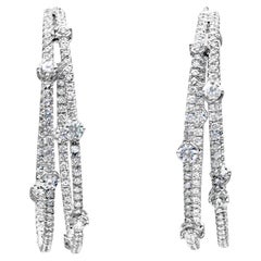 Roman Malakov, boucles d
oreilles à deux rangées de diamants ronds de 4,63 carats au total