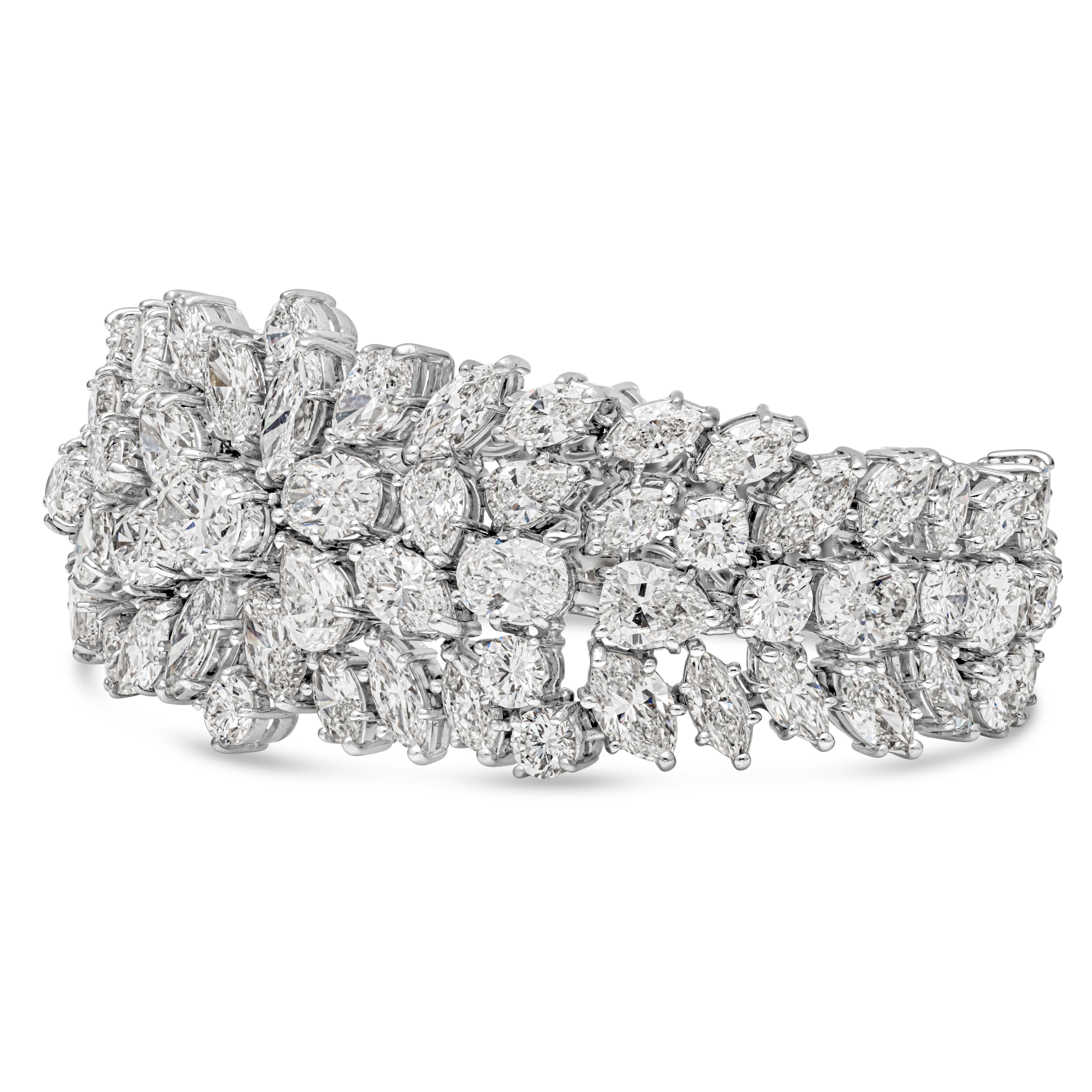Cet élégant et luxueux bracelet de tennis est orné de 105 diamants de taille fantaisie pesant 46,50 carats au total, de couleur D-E-F et de pureté VS, sertis dans un magnifique design moderne. Parfaitement réalisé en or blanc 18k et en platine et