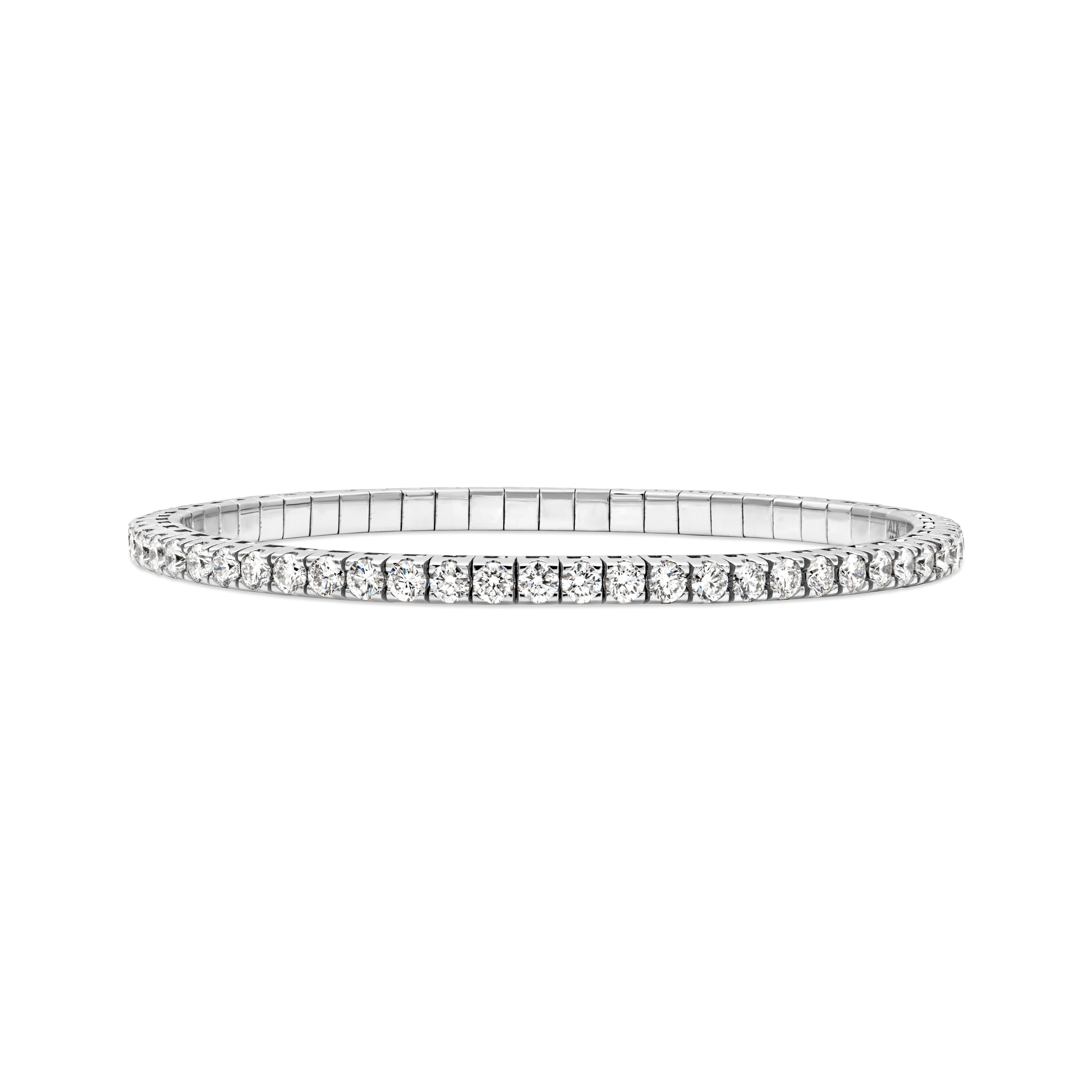 A timeless tennis bracelet showcasing a row of 60 round brilliant diamonds set in a stretchable 18k white gold mounting. Diamonds weigh 4.80 carats total, F color and VS2-SI1 in clarity. 7 inches in length.

Roman Malakov is a custom house,