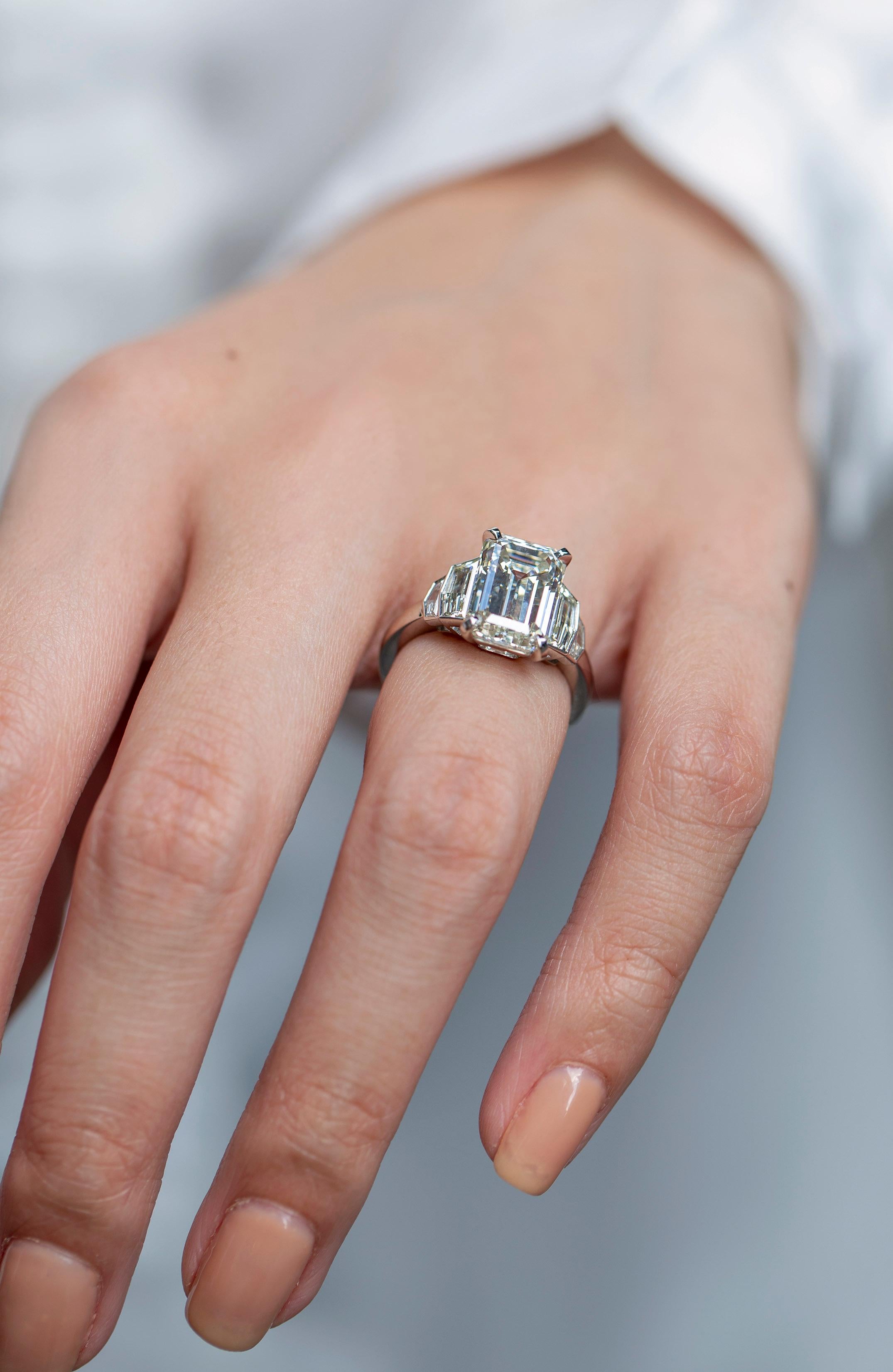 GIA Certified 5.01 Carats Emerald Cut Diamond Five-Stone Engagement Ring In New Condition For Sale In New York, NY