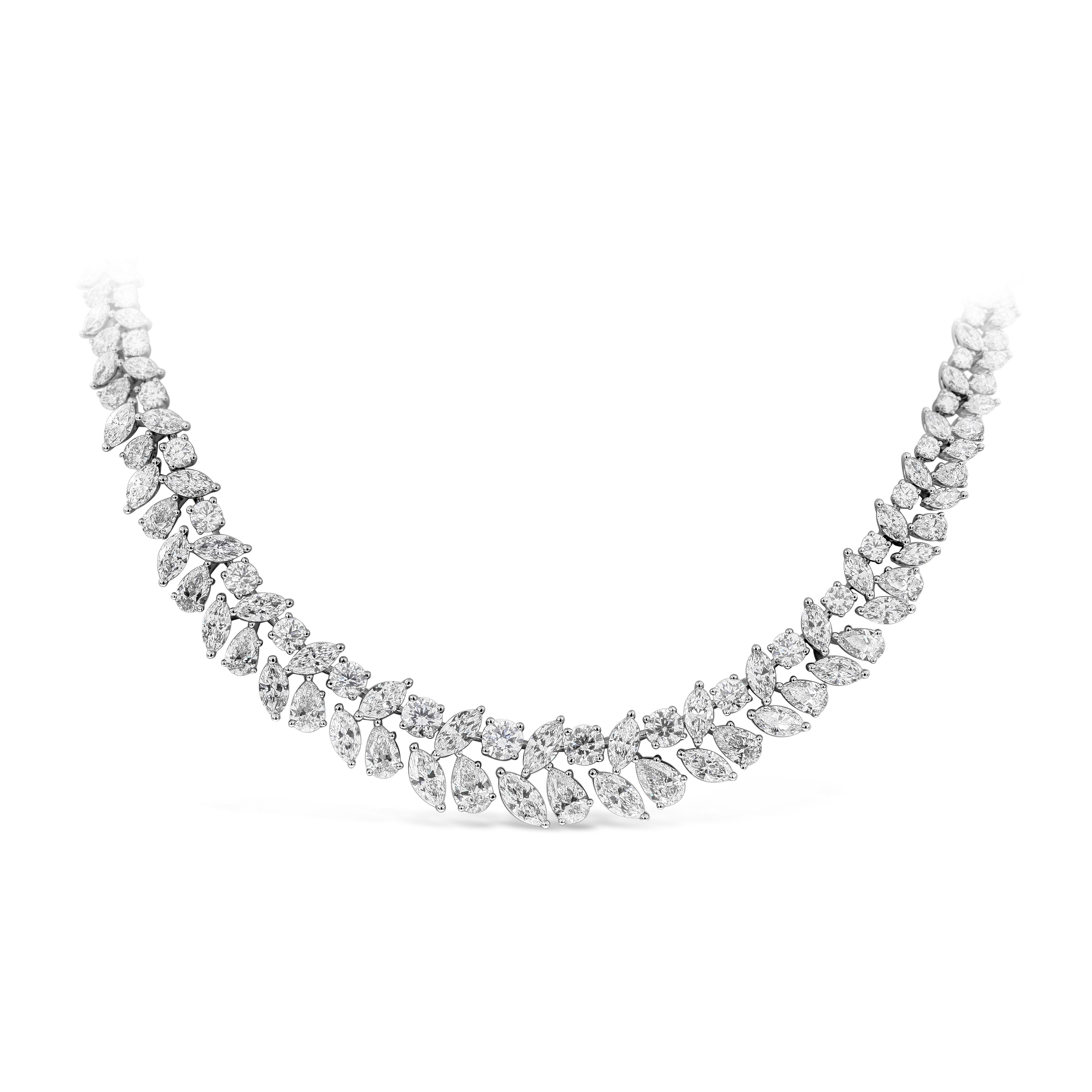 A brilliant necklace showcasing two rows of marquise, pear and round shape diamonds, hand-crafted in an 18K white gold mounting. Diamonds weigh 51.48 carats total, F-G color and VS-SI in clarity. Absolutely stunning work of art.