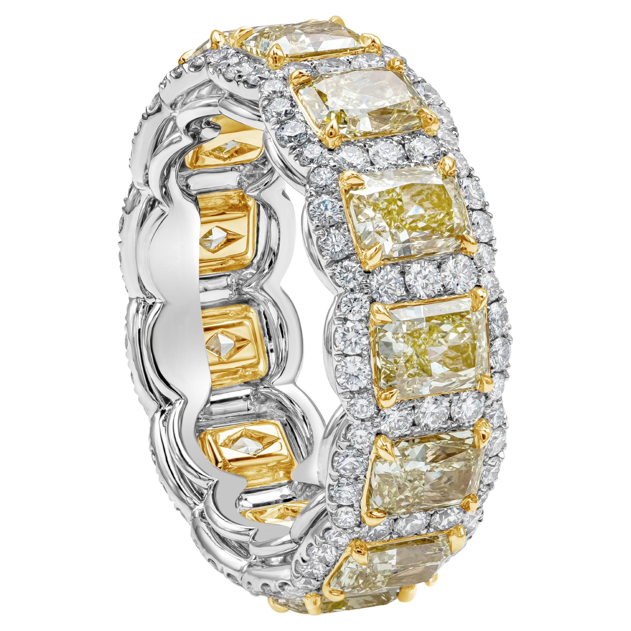 A stylish band showcasing vibrant radiant cut fancy yellow diamonds, each surrounded by a single row of round brilliant diamonds. Yellow diamonds weigh 5.33 carats total, VS in Clarity. Round diamonds weigh 1.30 carats total, F Color and VS in