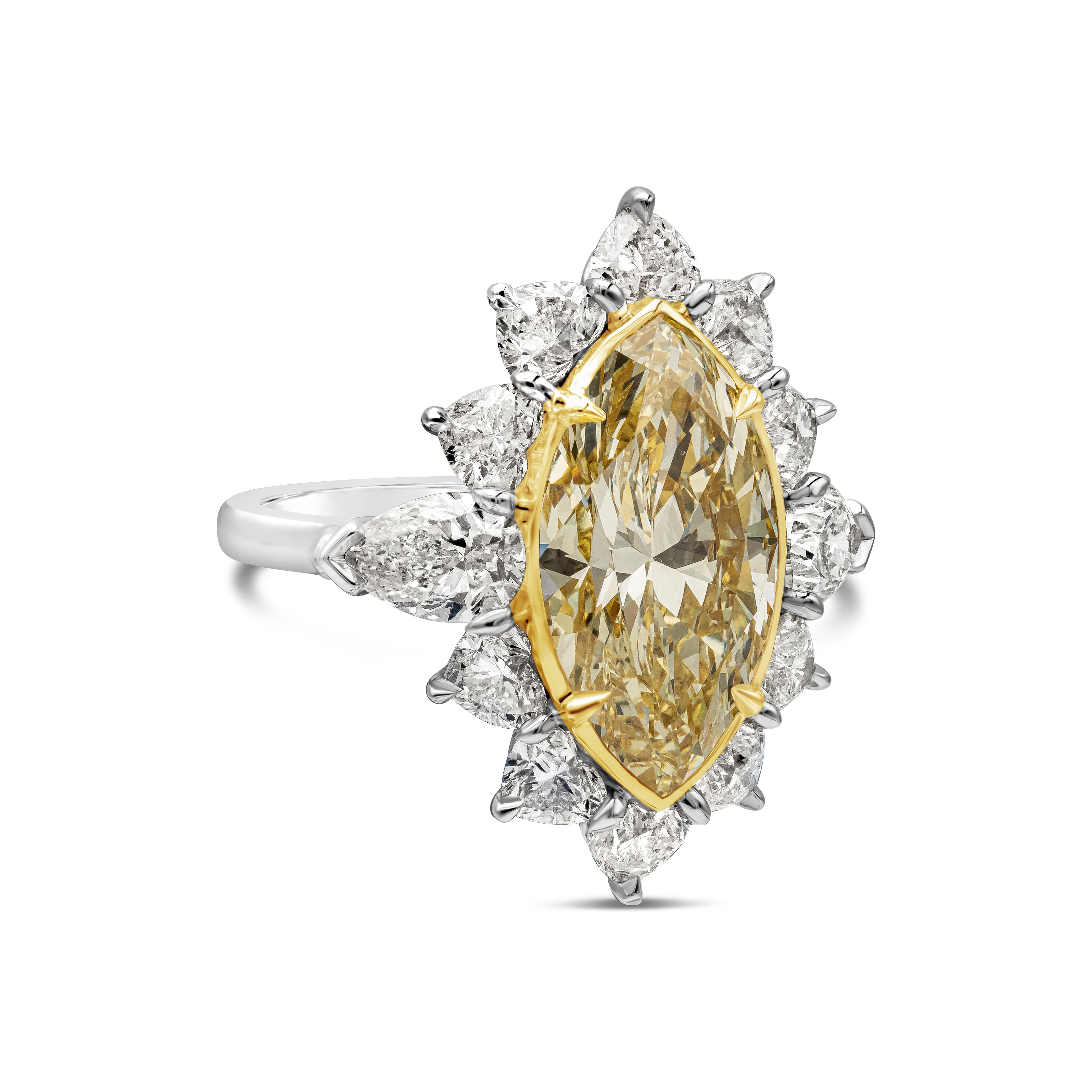 A unique ring, showcasing a 5.58 carats marquise cut diamond certified by GIA as Fancy Light Yellow color and VS2 clarity, bezel-set on a four prong setting made of 18K yellow gold. Surrounded by a halo of 10 heart shape diamonds with F color and VS