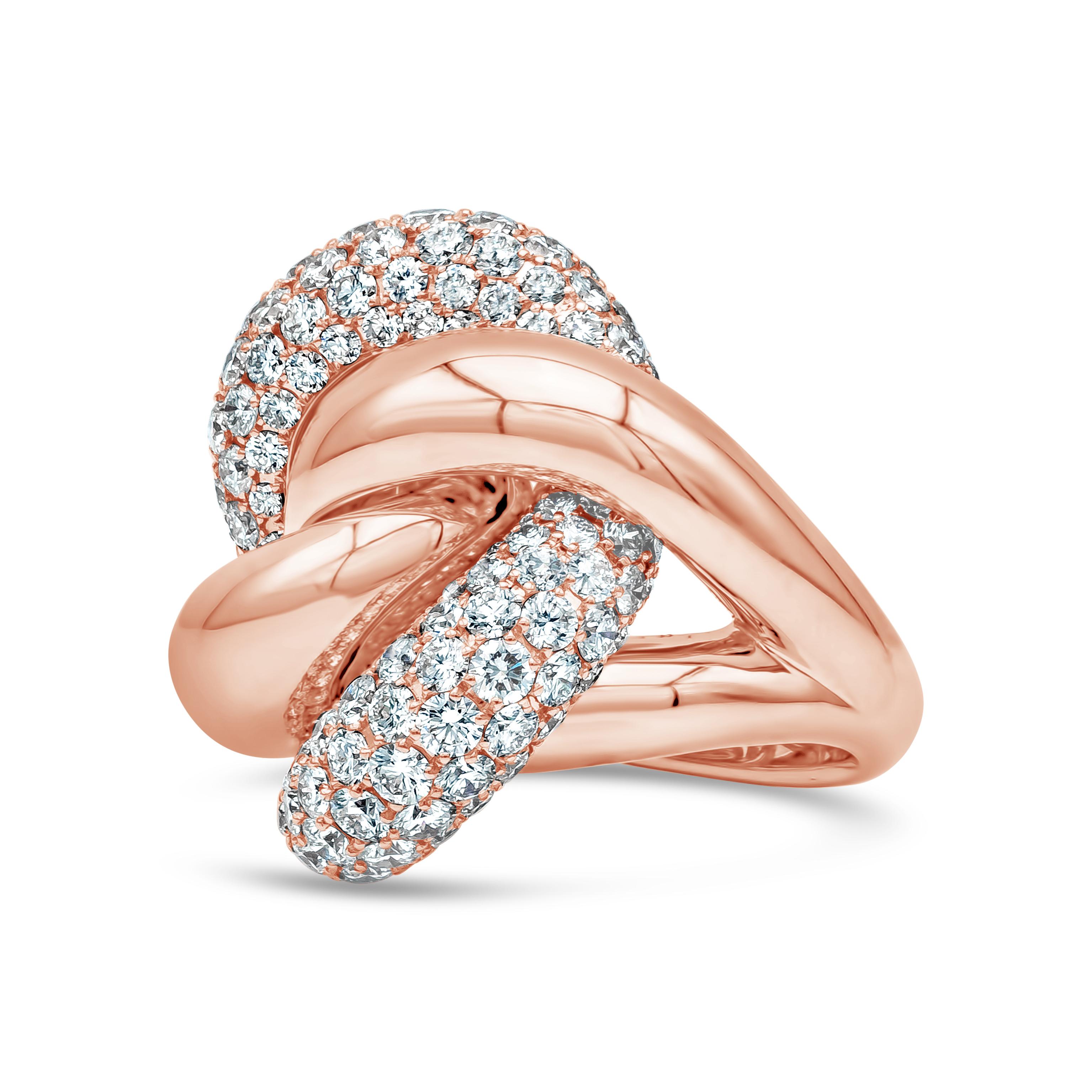 A chic and stylish fashion ring showcasing round brilliant diamonds that weigh 5.80 carats total in F Color and VS in Clarity. Set in an intricately designed intertwined mounting made in 18K Rose Gold. Size 7 US and resizable upon request.

Roman