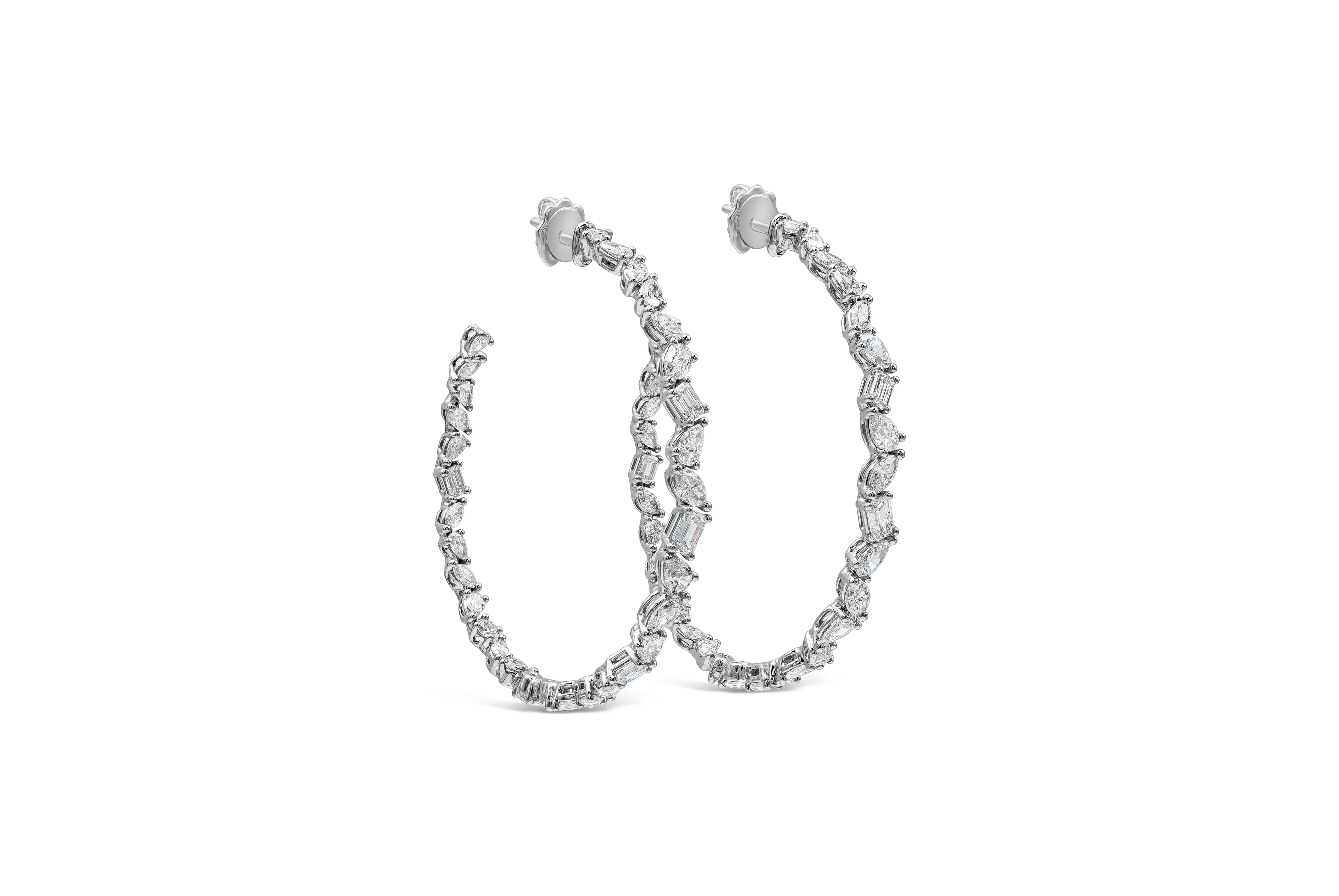 A chic and modern take on the classic hoop earrings. Showcasing a row of mixed shape diamonds, set in a zigzag design made in 18k white gold. Diamonds weigh 6.08 carats total.

Style available in different price ranges. Price are based on your