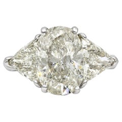 Roman Malakov, bague de fiançailles à trois pierres avec diamant taille ovale de 4,10 carats