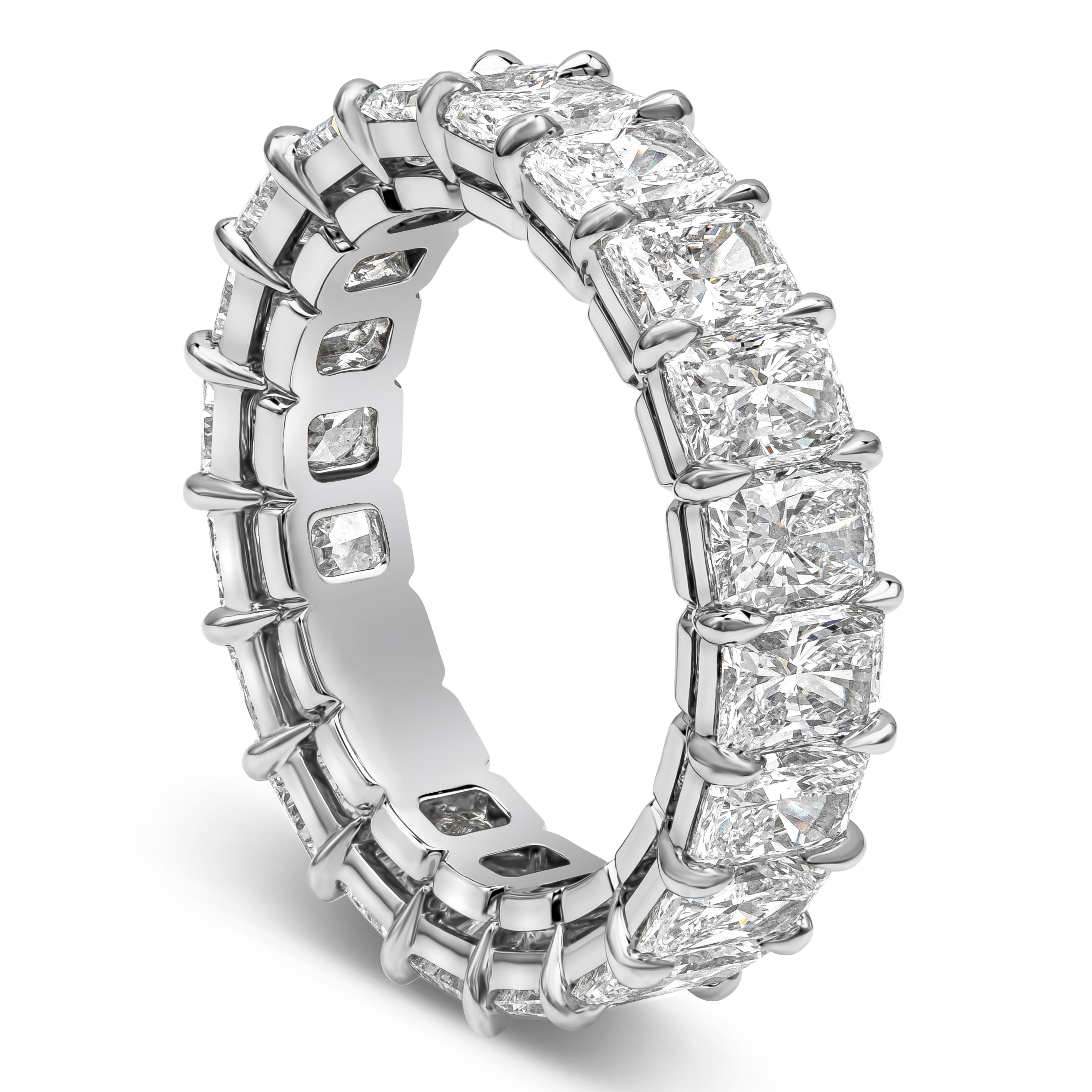 A classic eternity wedding band style showcasing a row of radiant cut diamonds weighing 6.36 carats total, D-E Color and VS+ in Clarity, set in a timeless shared prong setting. Made with Platinum, Size 6.5 US and resizable upon request.

Roman