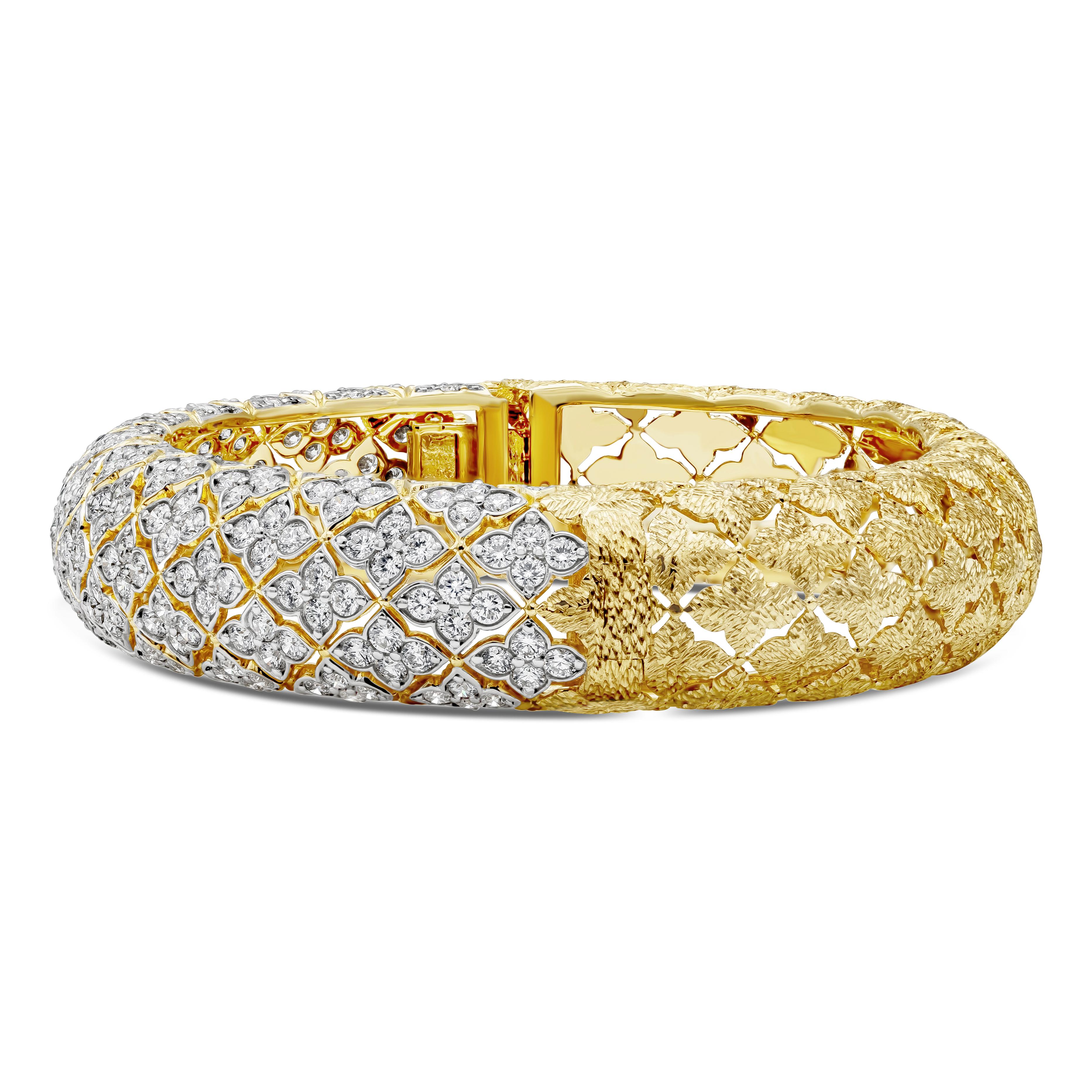A unique and elegant bangle bracelet showcasing perfectly matched brilliant round diamonds weighing 6.64 carat total in a flower design. Diamonds are F color and VS in clarity. Beautifully set in 18K Yellow Gold. 

