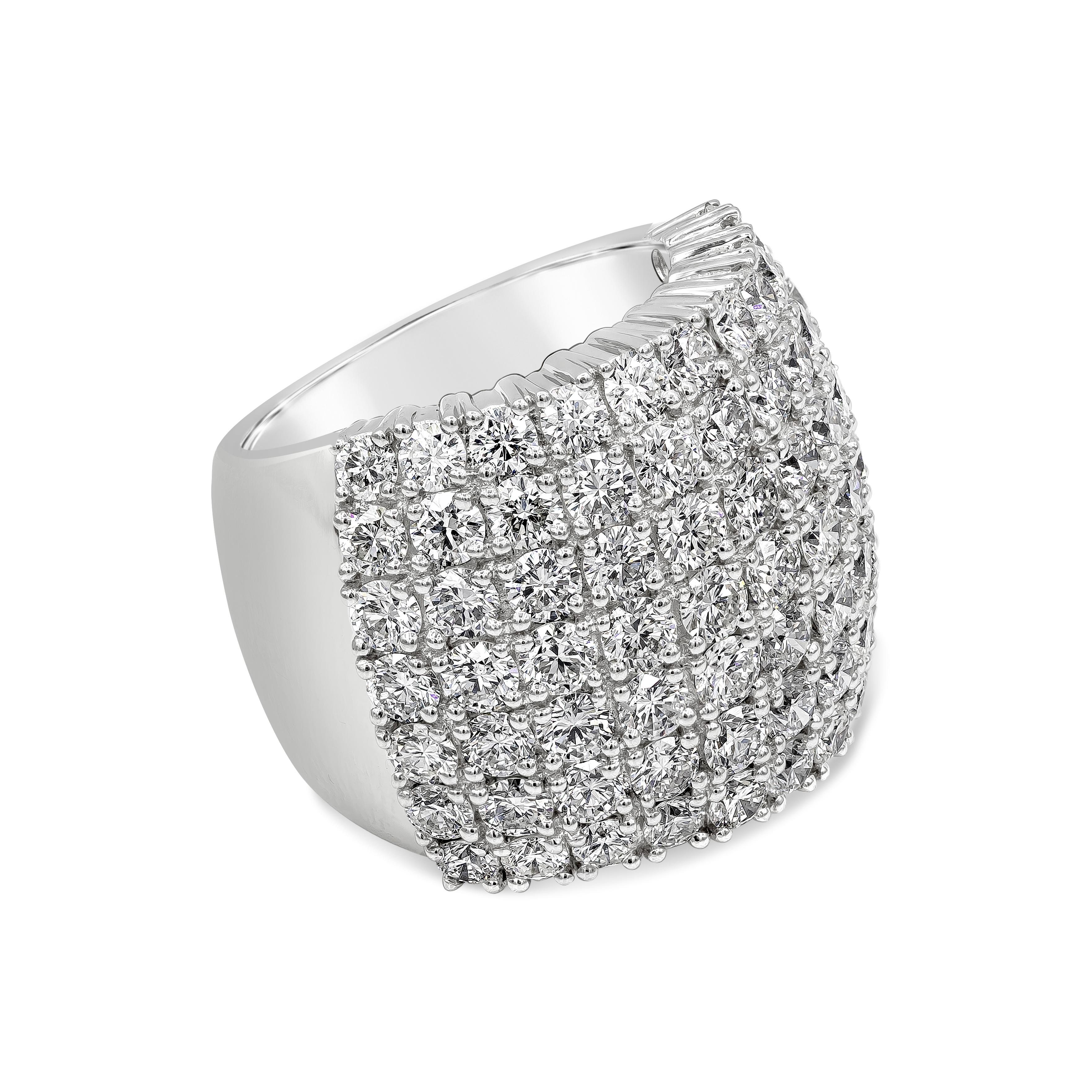 An immense wide cocktail ring featuring dazzling brilliant round diamonds weighing 6.73 carats total, set in a wide multi-row pave curved design band. Finely made in 18K White Gold. Size 7.25 US resizable upon request and 20.25mm in width.

Style