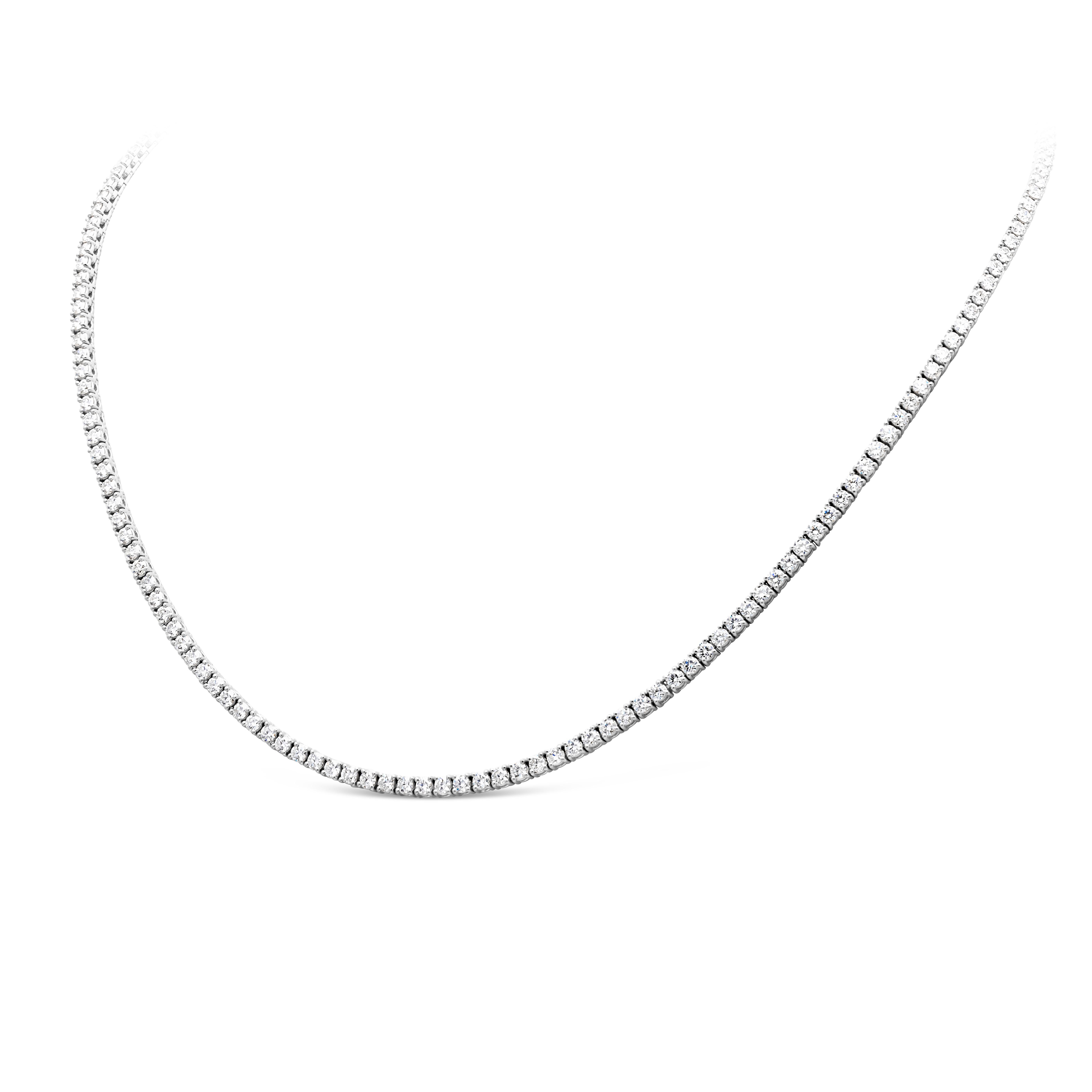 A classic and timeless tennis necklace showcasing a row of graduating 167 brilliant round shape diamonds weighing 6.85 carats total, F color and SI in clarity. Beautifully set in a four prong 14K White Gold setting and 17 inches in Length.

Roman