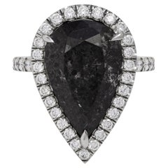 Anillo de compromiso con halo de diamantes gris oscuro con certificado GIA de 7,19 quilates y forma de pera