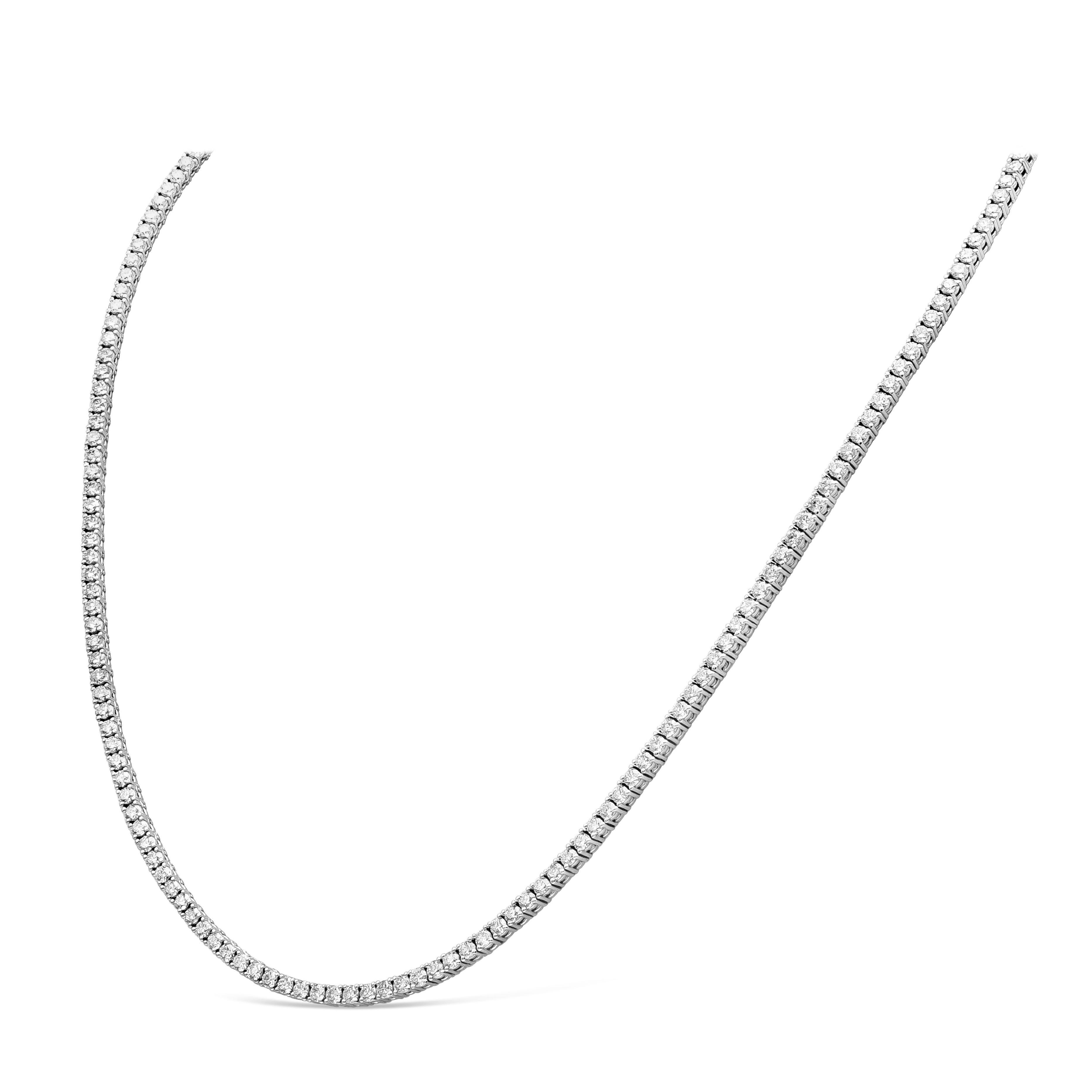 A classic tennis necklace, showcasing 192 round brilliant cut diamonds weighing 7.30 carats total with approximately F color and VS-SI clarity, each set on a four prong setting. Finely made with 18K white gold, 18 inches in length. Perfect for