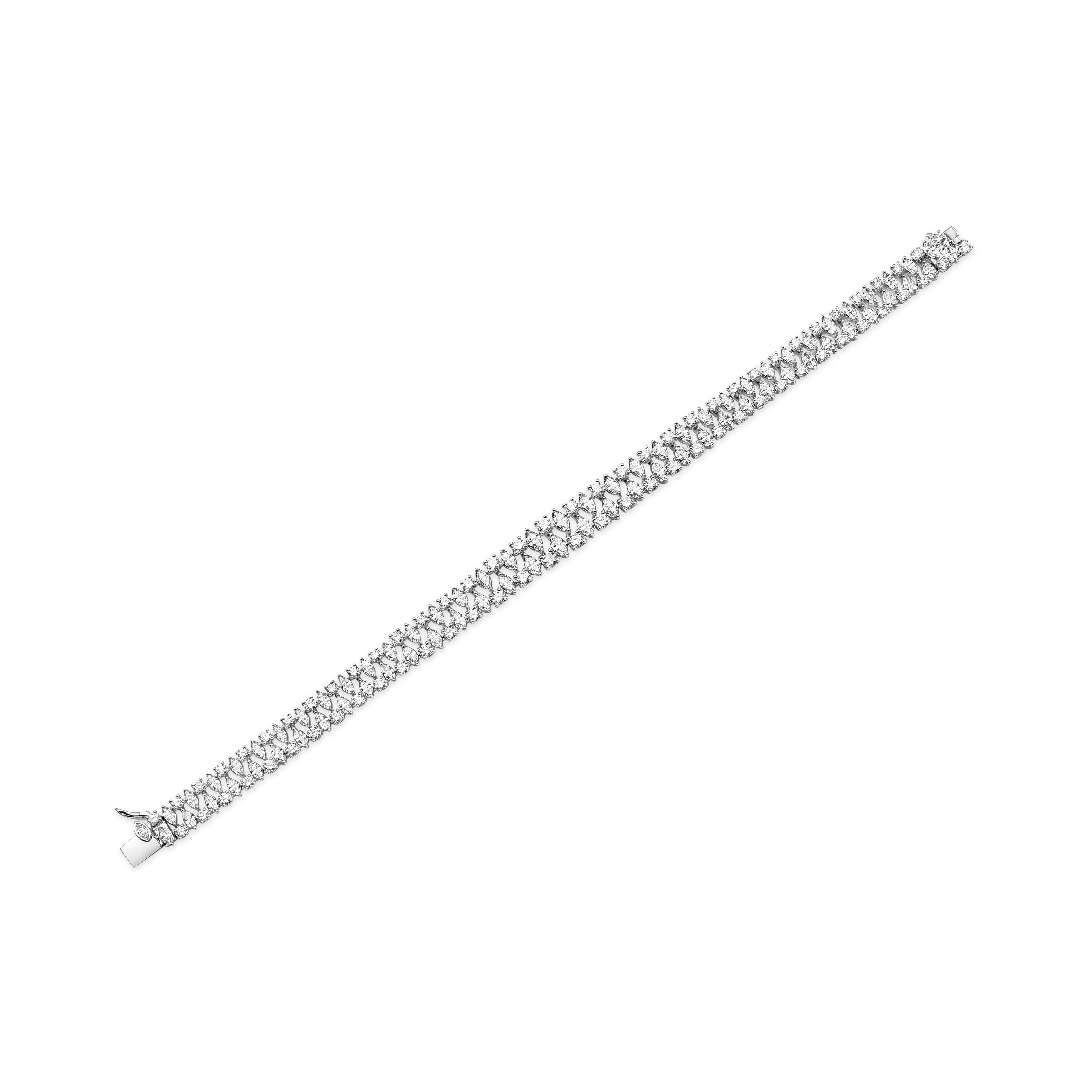 This elegant diamond bracelet showcase a row of round and marquise cut diamonds that weighs 7.33 carats total. The length of this elegant bracelet is 182mm while the width is 6mm - 8mm and weighs 24.60 grams. Made with 18K White Gold.

Roman Malakov