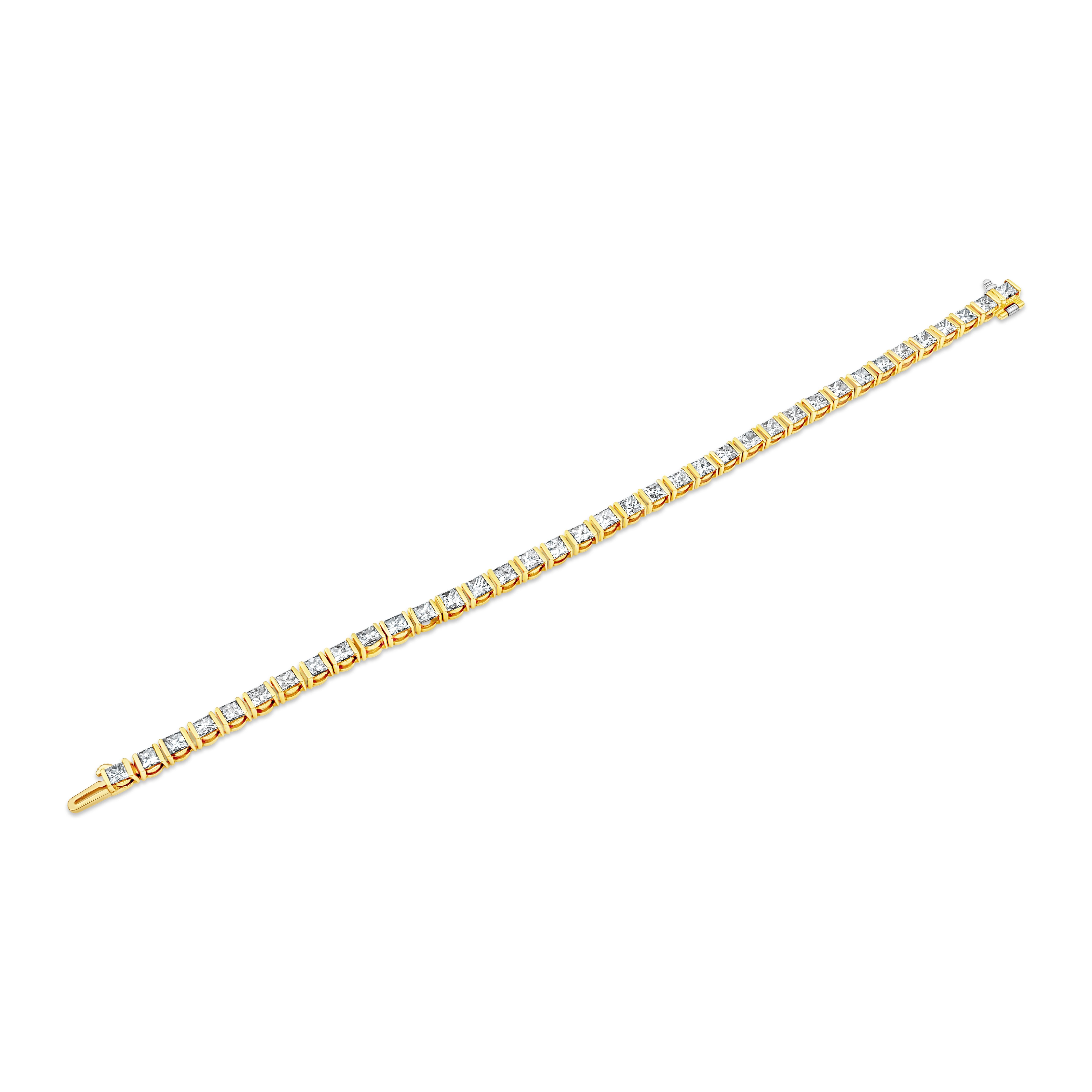 This gorgeous diamond tennis bracelet showcases 7.71 carats total princess cut diamonds. Mounted in half bezel setting. Made in 18K Yellow Gold. 

Roman Malakov is a custom house, specializing in creating anything you can imagine. If you would like