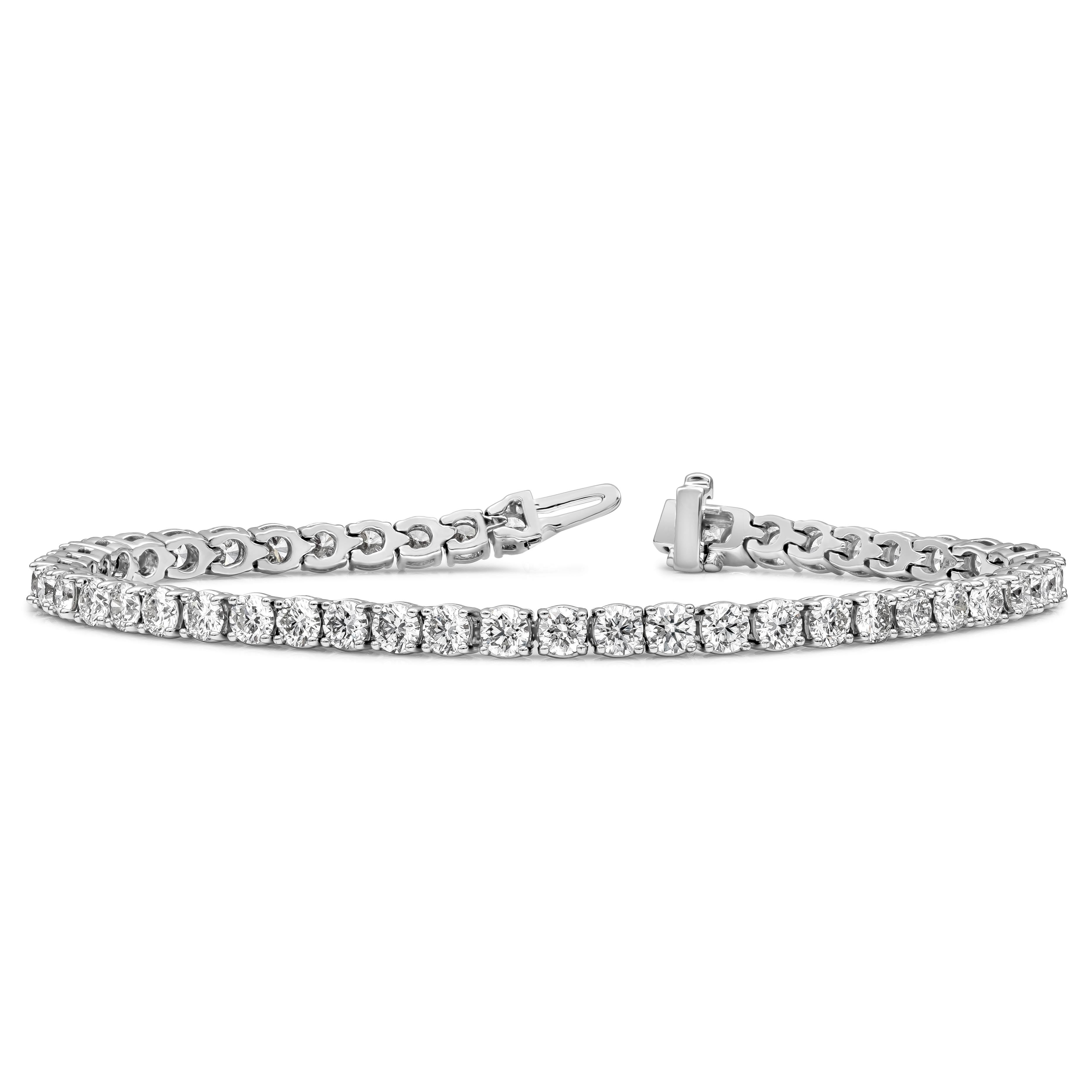 A classic tennis bracelet style showcasing 48 round brilliant diamonds, Diamonds weigh 8.02 carats total and are approximately F color, SI clarity. Set in a polished 14K White Gold 

Roman Malakov is a custom house, specializing in creating anything