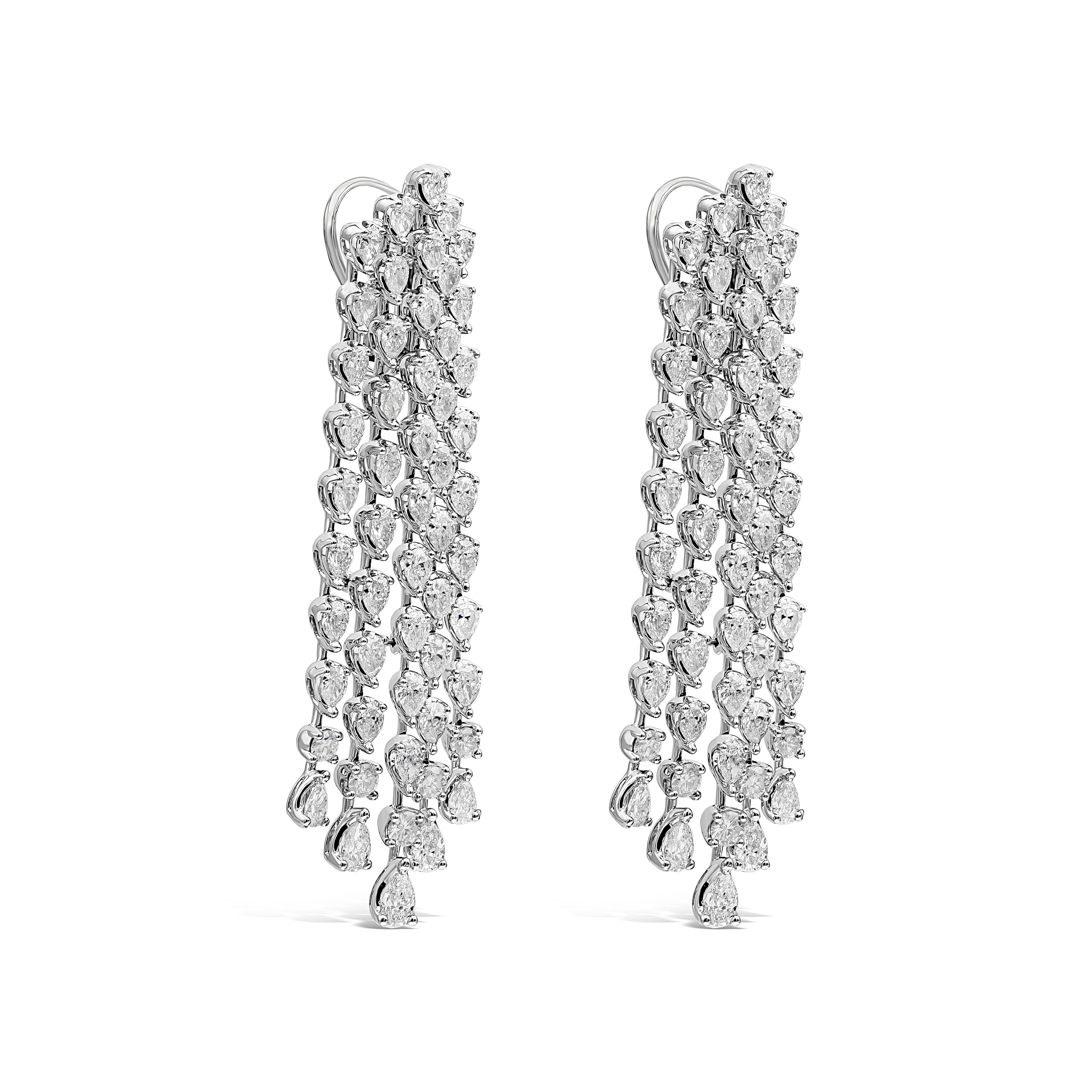 A sophisticated piece of jewelry showcasing five-rows of pear shape diamonds set in an elegant chandelier waterfall design. Total carat weight of the diamonds is 8.10 carats. The piece is 60mm in length, 16mm in width and weighs 20.50 grams.  Made