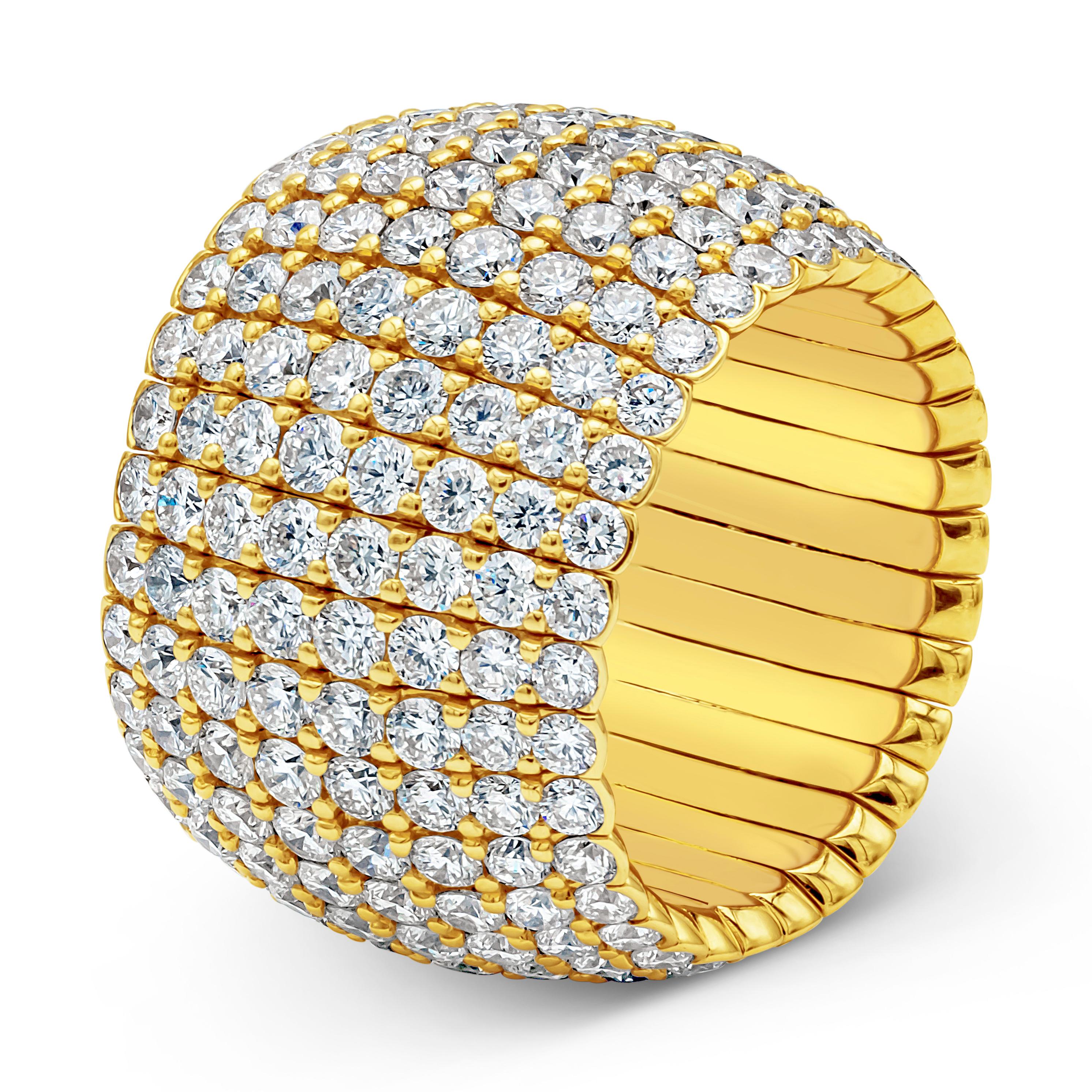 This stylish and stunning flexible fashion ring showcases eight rows of 256 brilliant round cut diamonds weighing 8.11 carats total, set in a beautiful micro-pave set and share prong setting. Finely made in 18k yellow gold. Size 6.5 US resizable
