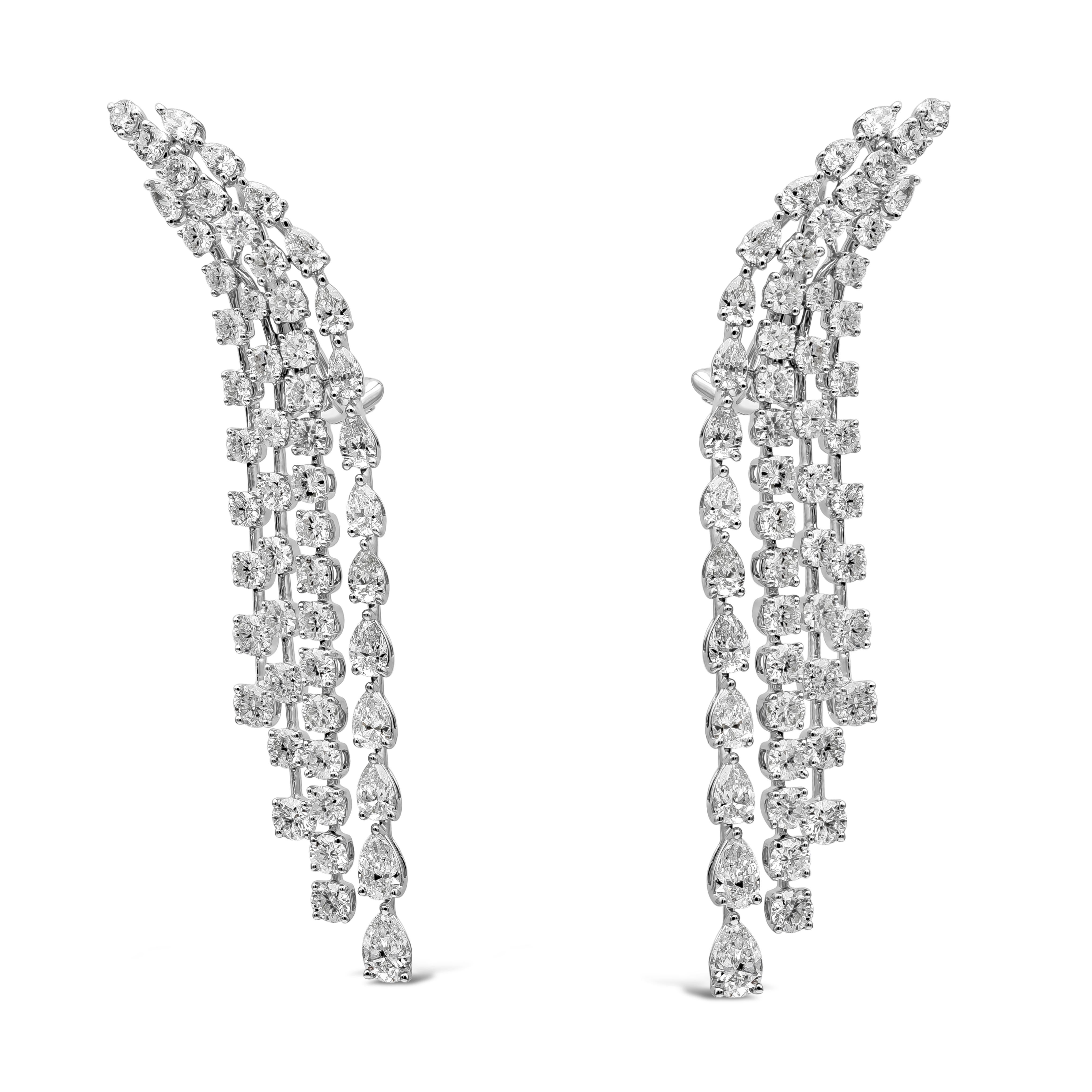 A sophisticated piece of jewelry showcasing five-rows of round brilliant pear shape illusion diamonds set in an elegant chandelier waterfall design. Total carat weight of the diamonds is 9.98 carats. The piece is 65mm in length, 18mm in width and