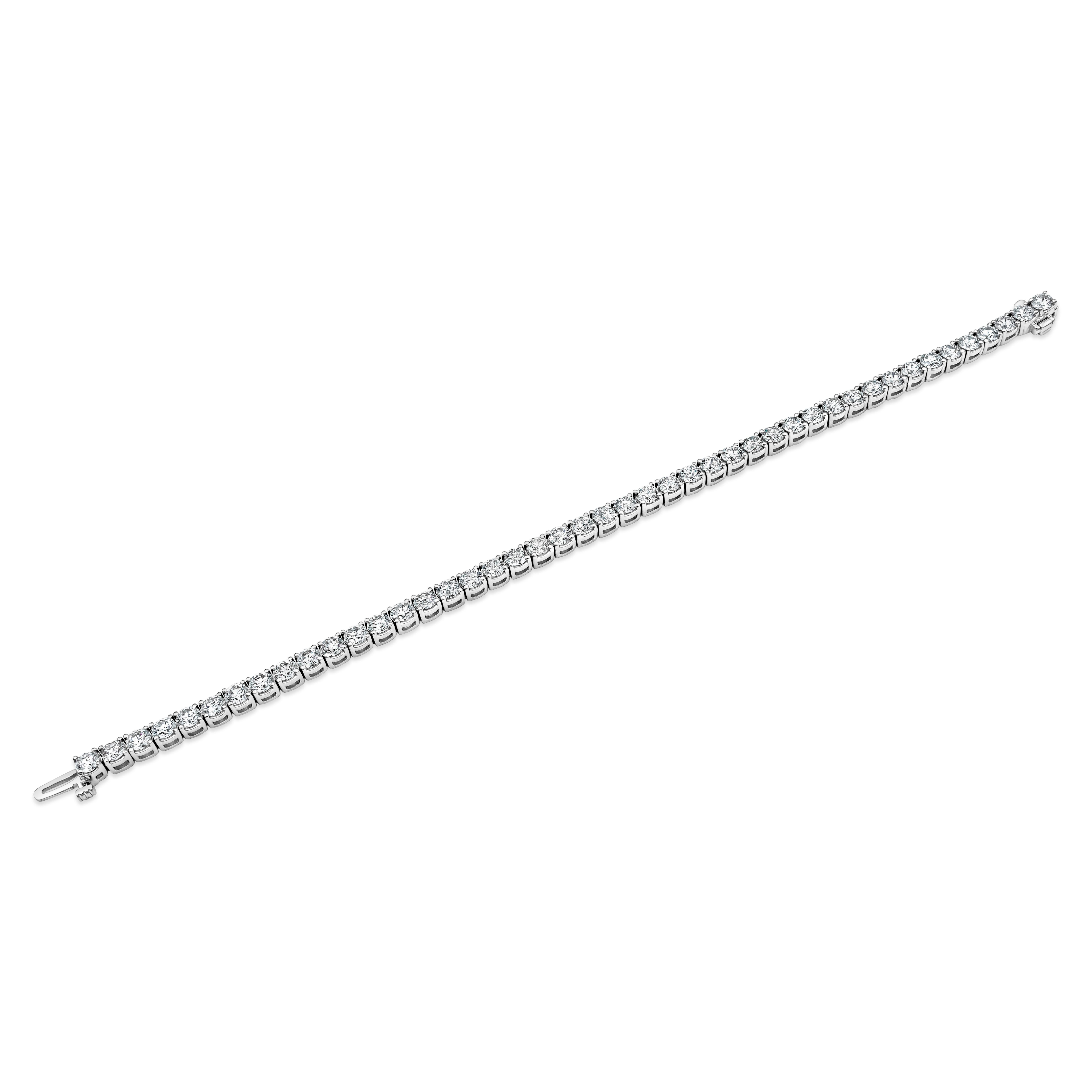 This tennis bracelet has a total of 45 brilliant round diamonds that has a stone size of 3.70mm. Diamonds weigh 8.71 carats total, G color, SI2/I1 clarity. Made in 14K White Gold. 7 inches length.

Roman Malakov is a custom house, specializing in
