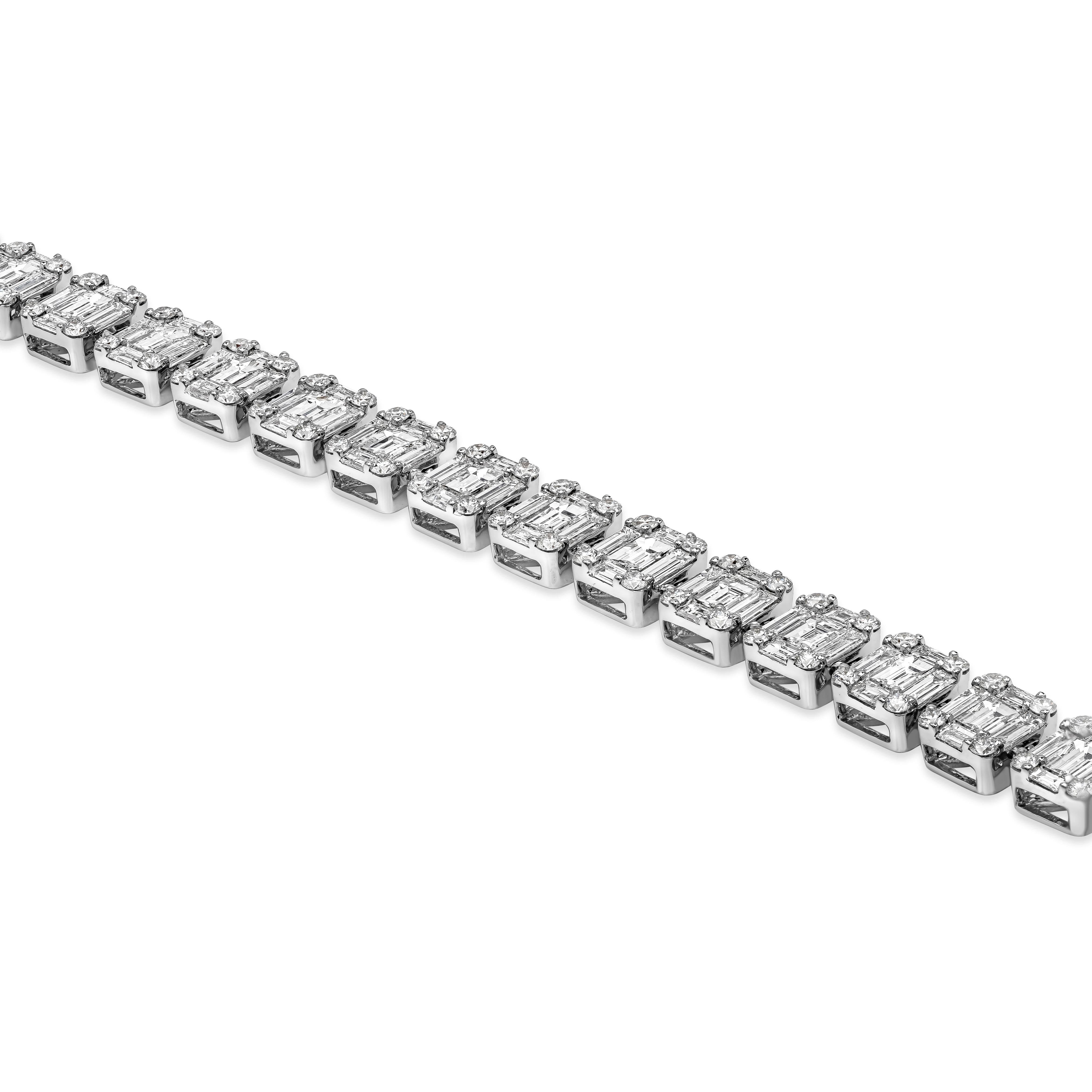 A unique and budget-friendly bracelet showcasing a cluster of baguette and round diamonds arranged to look like emerald cut diamonds, set in a polished 18k white gold mounting. Diamonds weigh 8.79 carats total and are approximately F-G color, VS