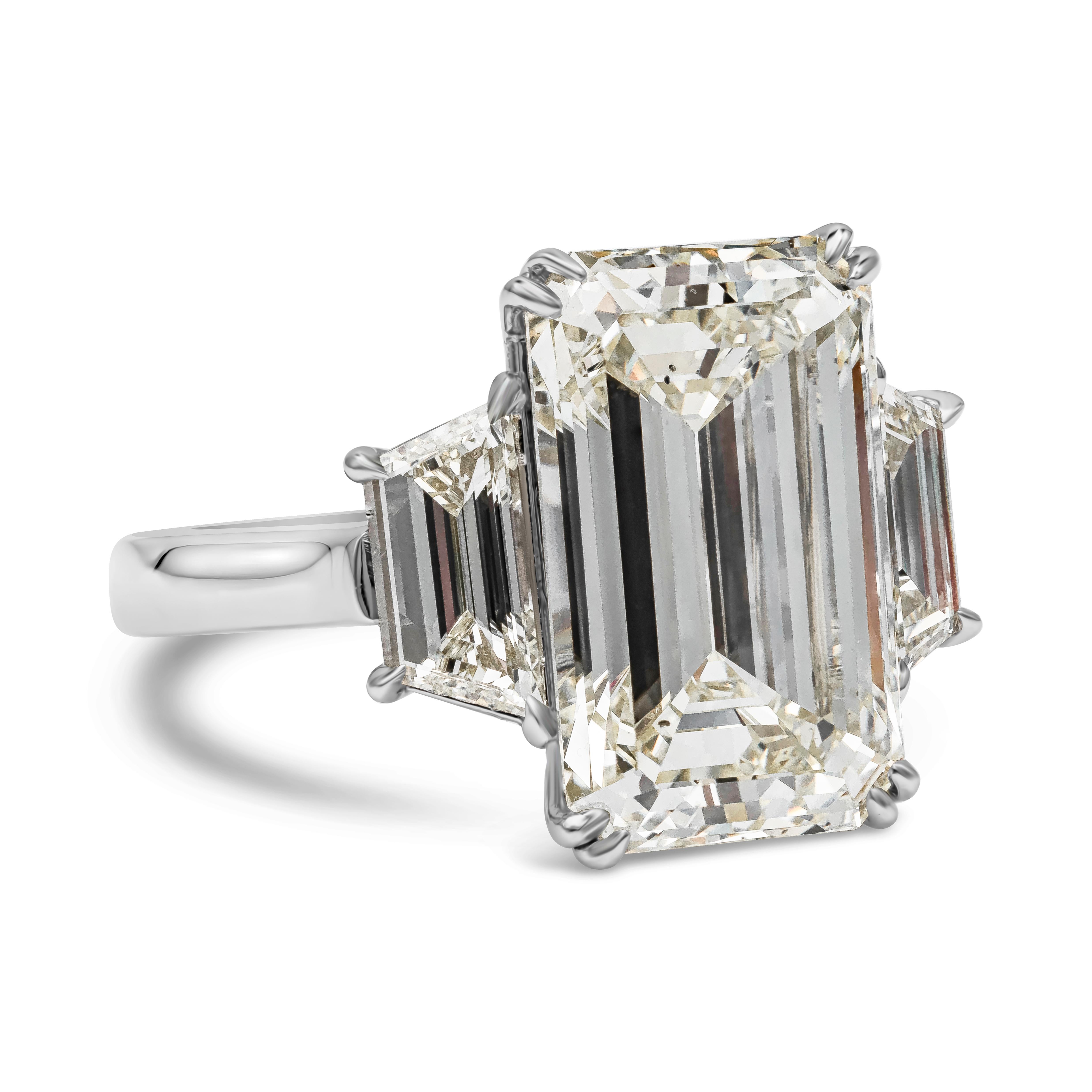GIA Certified 8.96 carat emerald cut diamond center stone, O Color and SI in Clarity. Accented by a trapezoid diamond side stone on each side, weighing 1.40 carats total. Made with Platinum. Size 6.5 US

Style available in different price ranges.