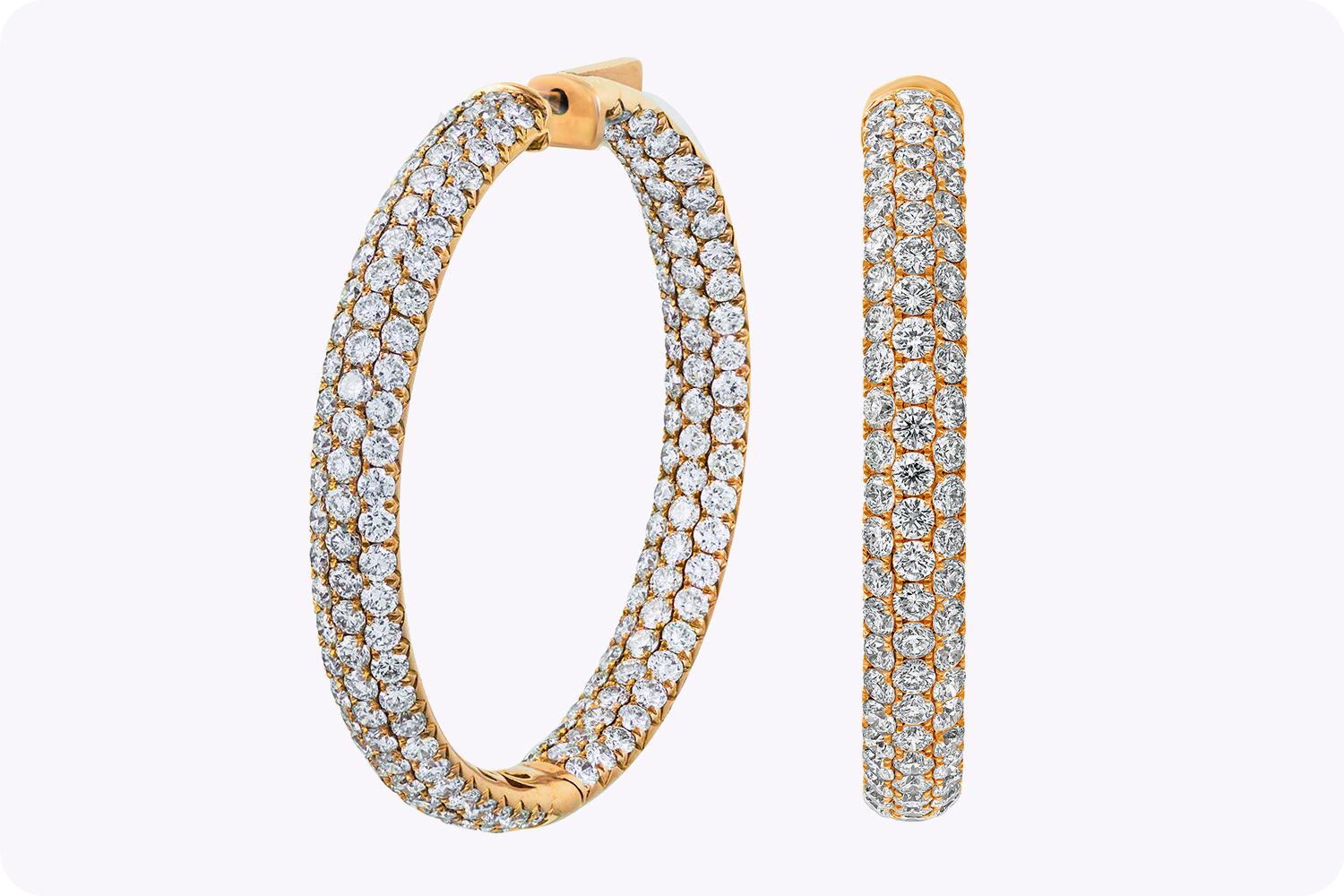 A classic hoop earrings showcasing pave set round diamonds in the inside and outside weighing 9.55 carats total. Made in 18k Rose Gold.

Roman Malakov is a custom house, specializing in creating anything you can imagine. If you would like to receive