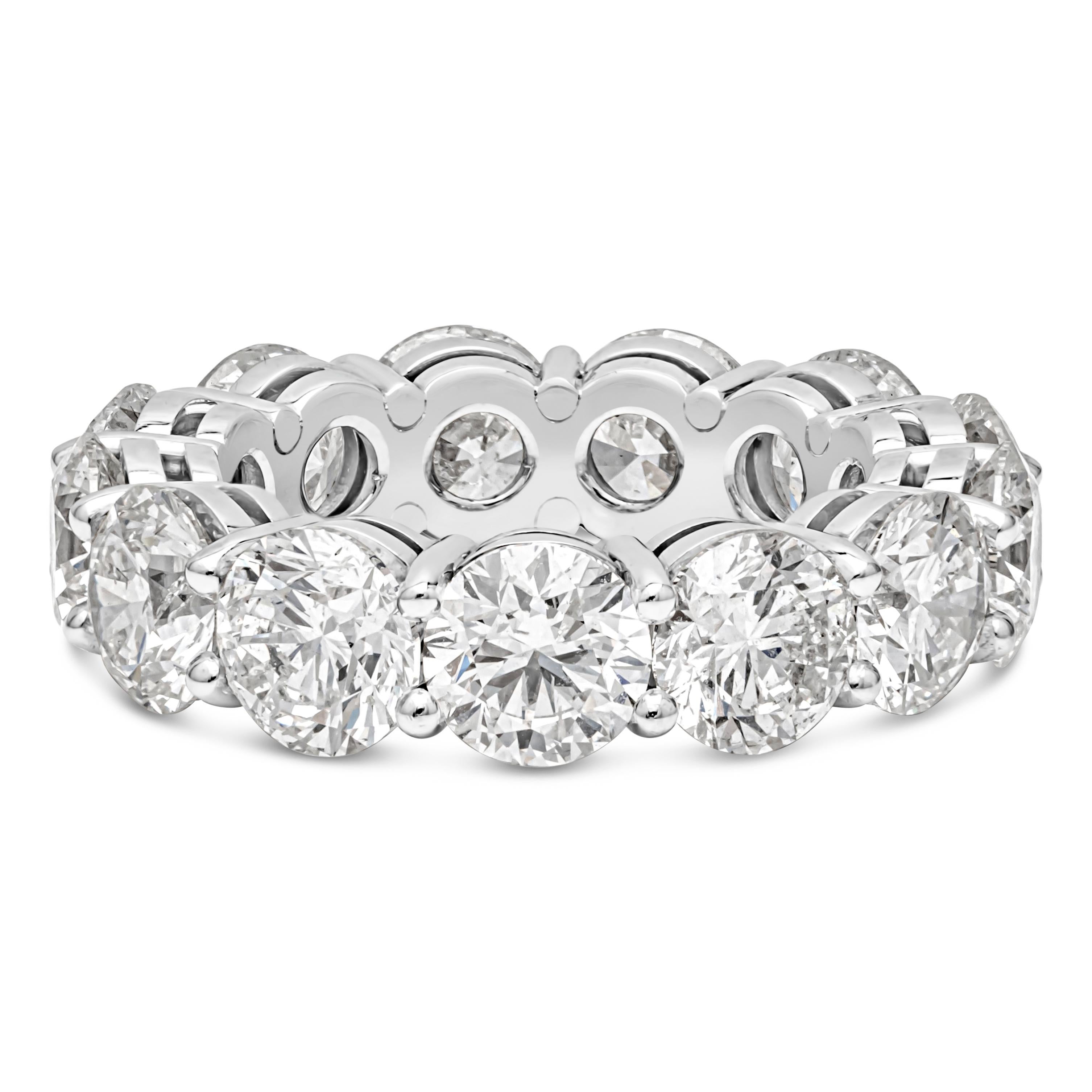 This gorgeous eternity wedding band showcasing 13 round brilliant diamonds weighing 9.56 carats total. Each diamond is approximately G-H color and SI2 in clarity. Set in a timeless shared prong setting and made in platinum. Size 6.25 US, 0.22 inches