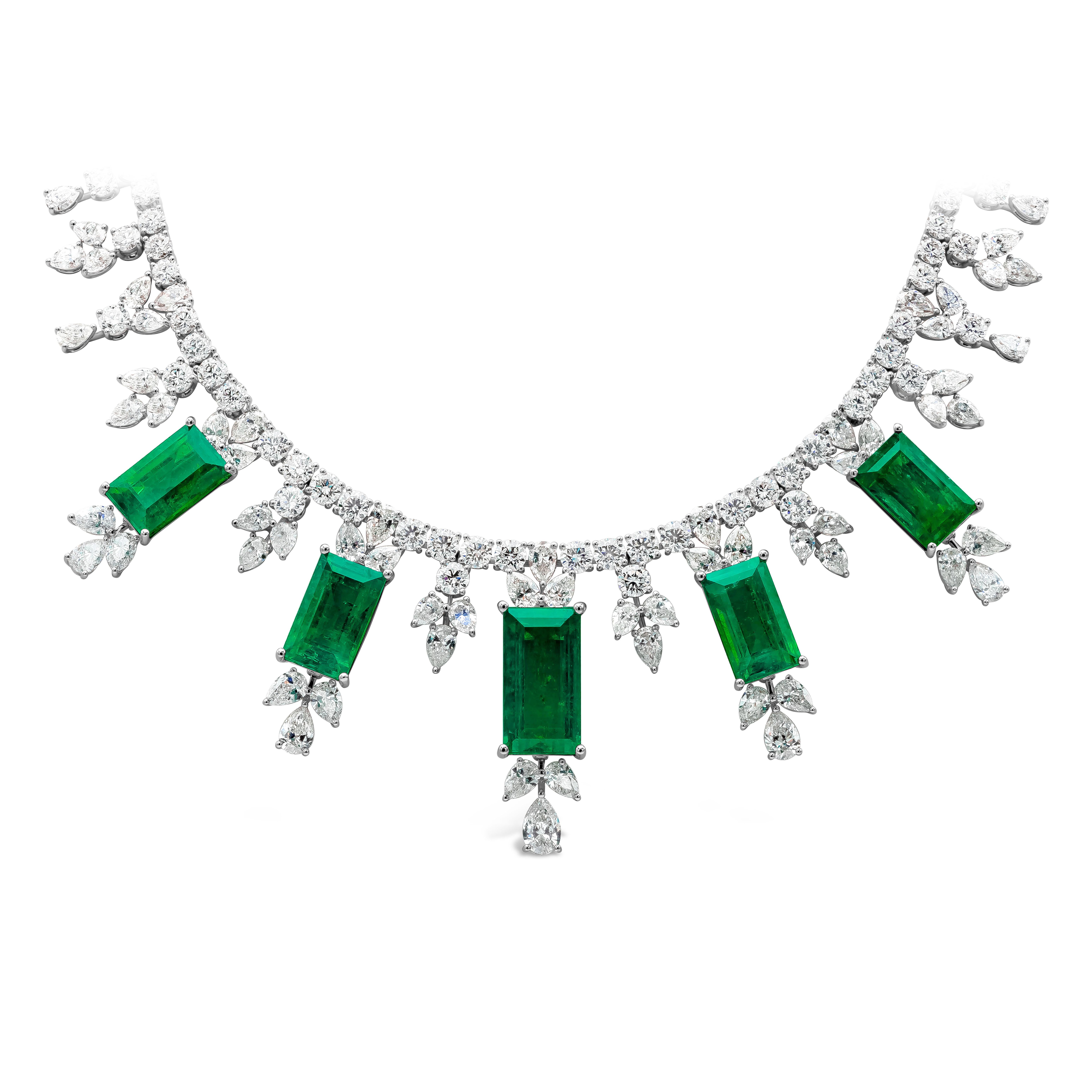 This luxuriously looking high-end drop necklace highlighting five GRS certified Colombian emeralds weighing 48.68 carats total set with pear & round shaped diamonds weighing 47.08 carats total.  Hand-crafted in 18K White Gold.

Style available with