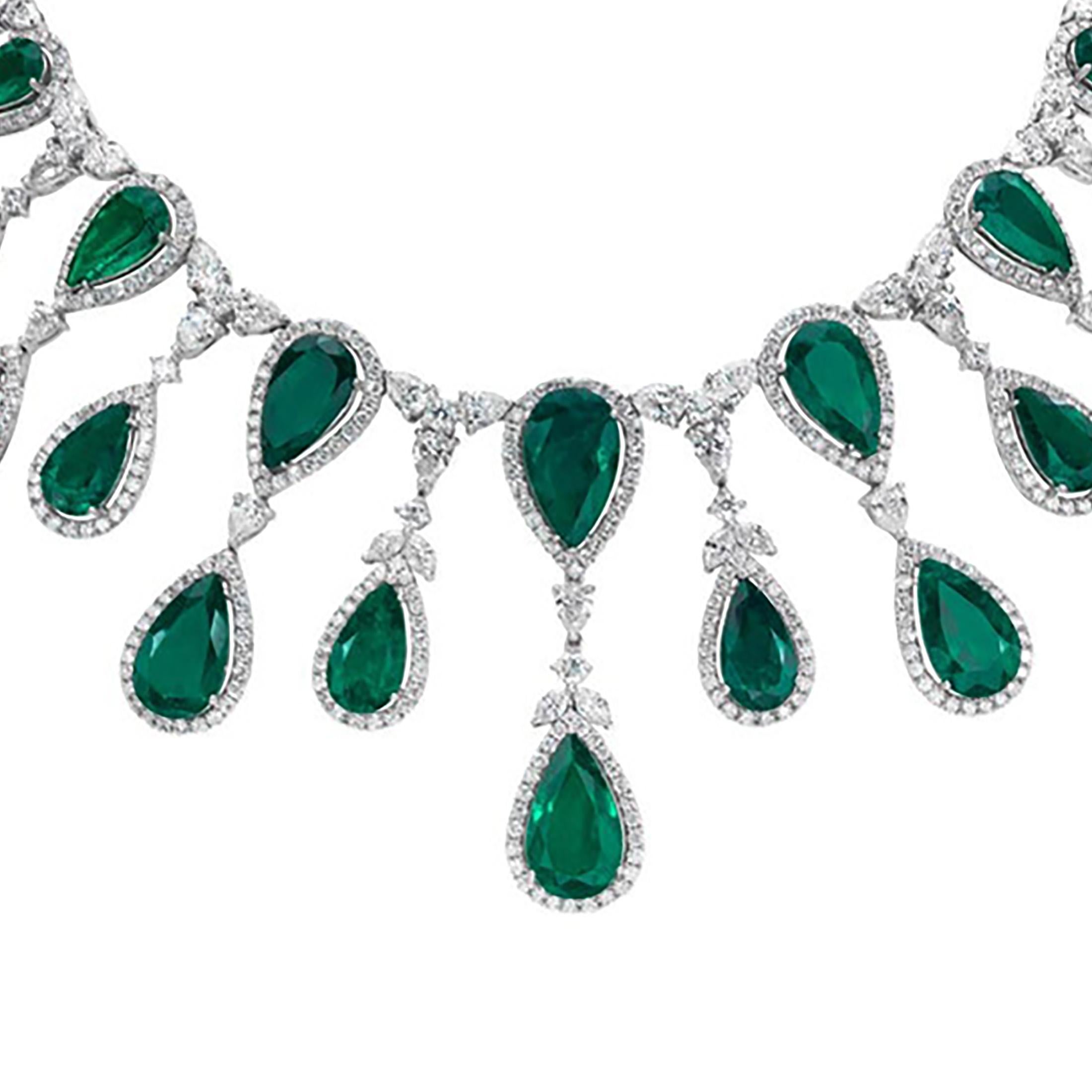 Elegant and well crafted high end necklace that took Roman Malakov more than a decade to source the stones, and make. Showcases perfectly-matched 20 pear shape green emeralds weighing 63.40 carats, surrounded by 758 brilliant diamonds. Diamonds