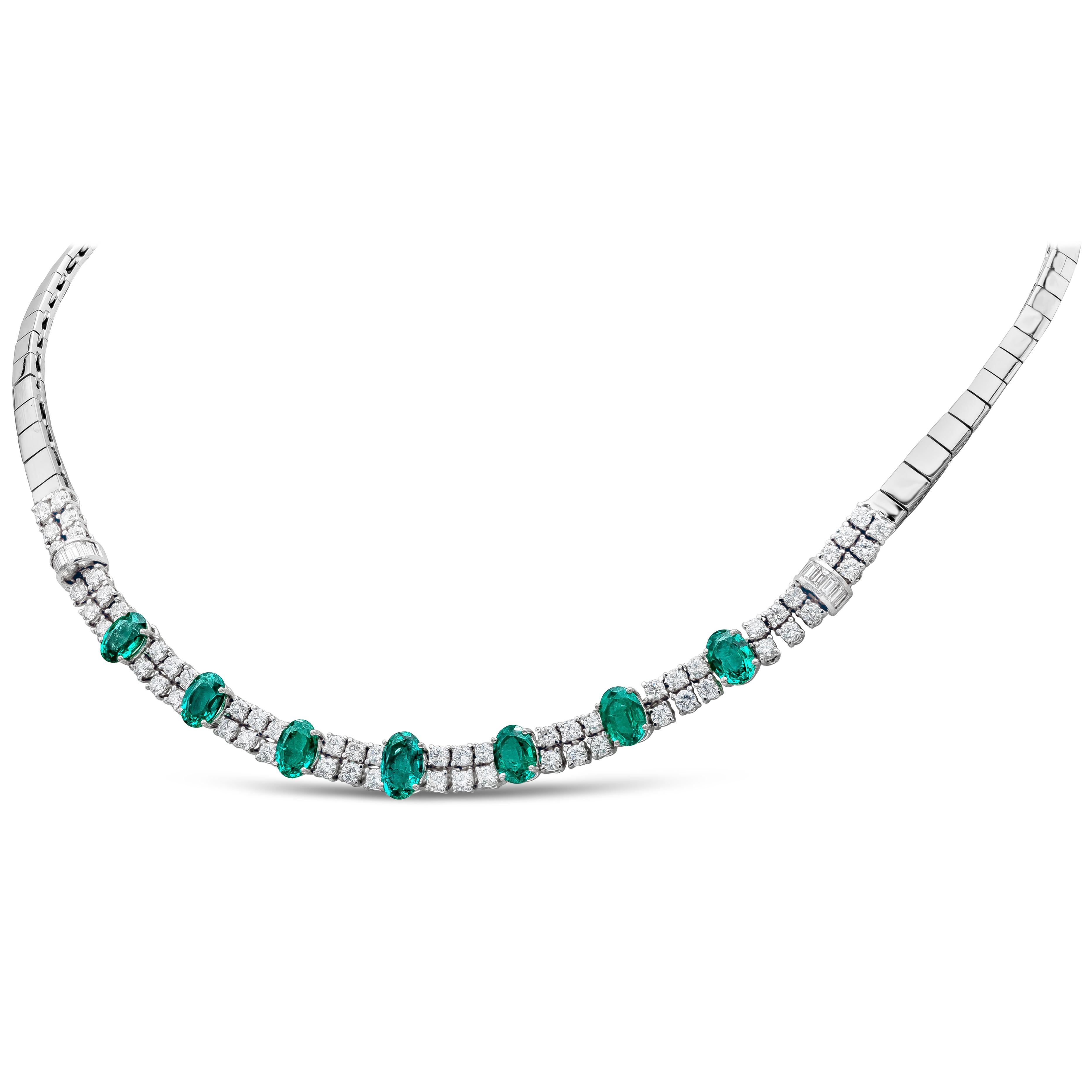 Fashionable necklace set with 7 natural green emeralds weighing 5.66 carats. Each emerald is spaced with 2 rows of round brilliant diamonds, Baguette diamonds channel set in a circular design attached on each side of the necklace. Diamonds weighing