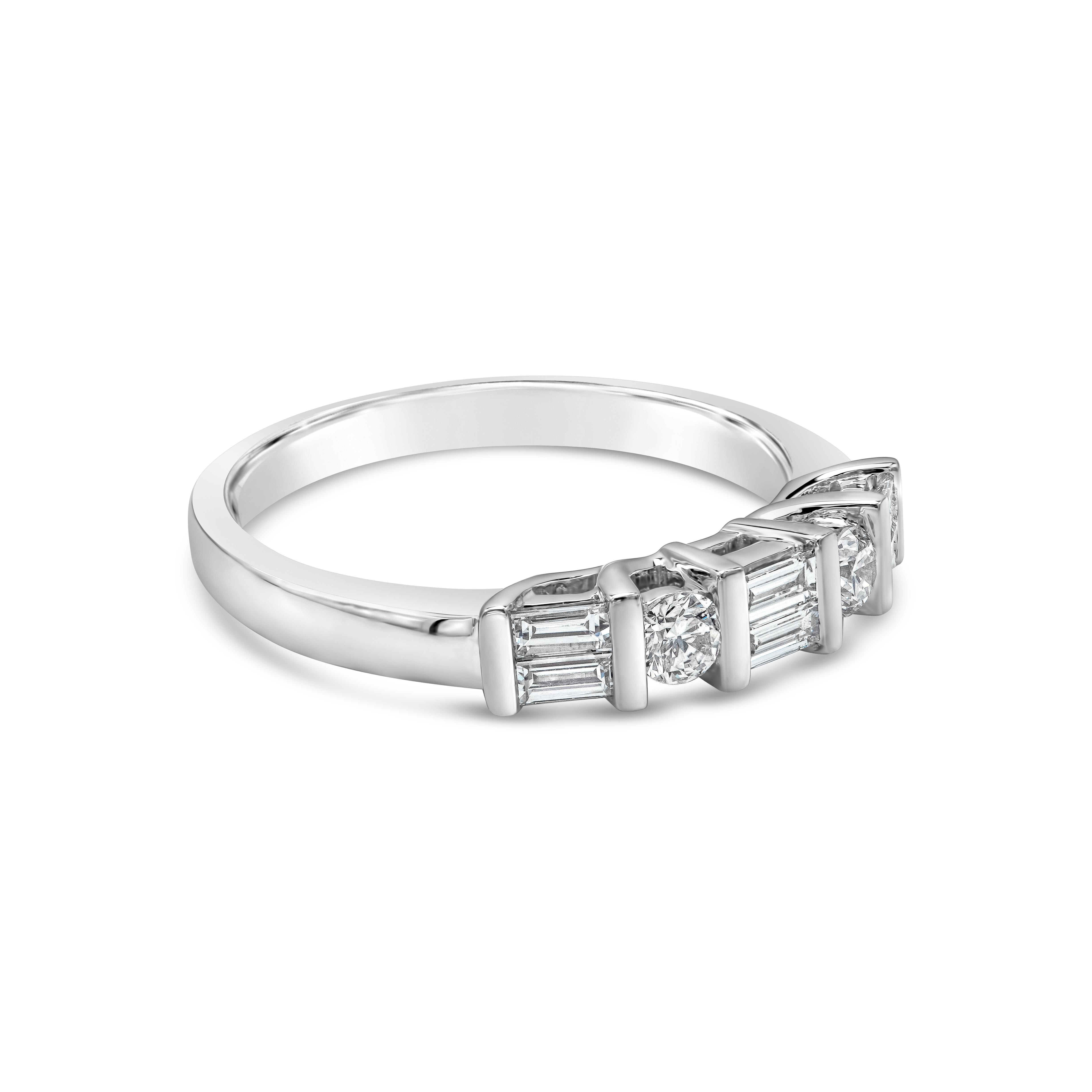 Features a five stone wedding band ring with baguette diamonds weighing 0.33 carats total, alternating elegantly with round diamonds weighing 0.19 carats total. Set on 18K white gold with bars in between. Size 6.5 US, resizable upon request.

Roman