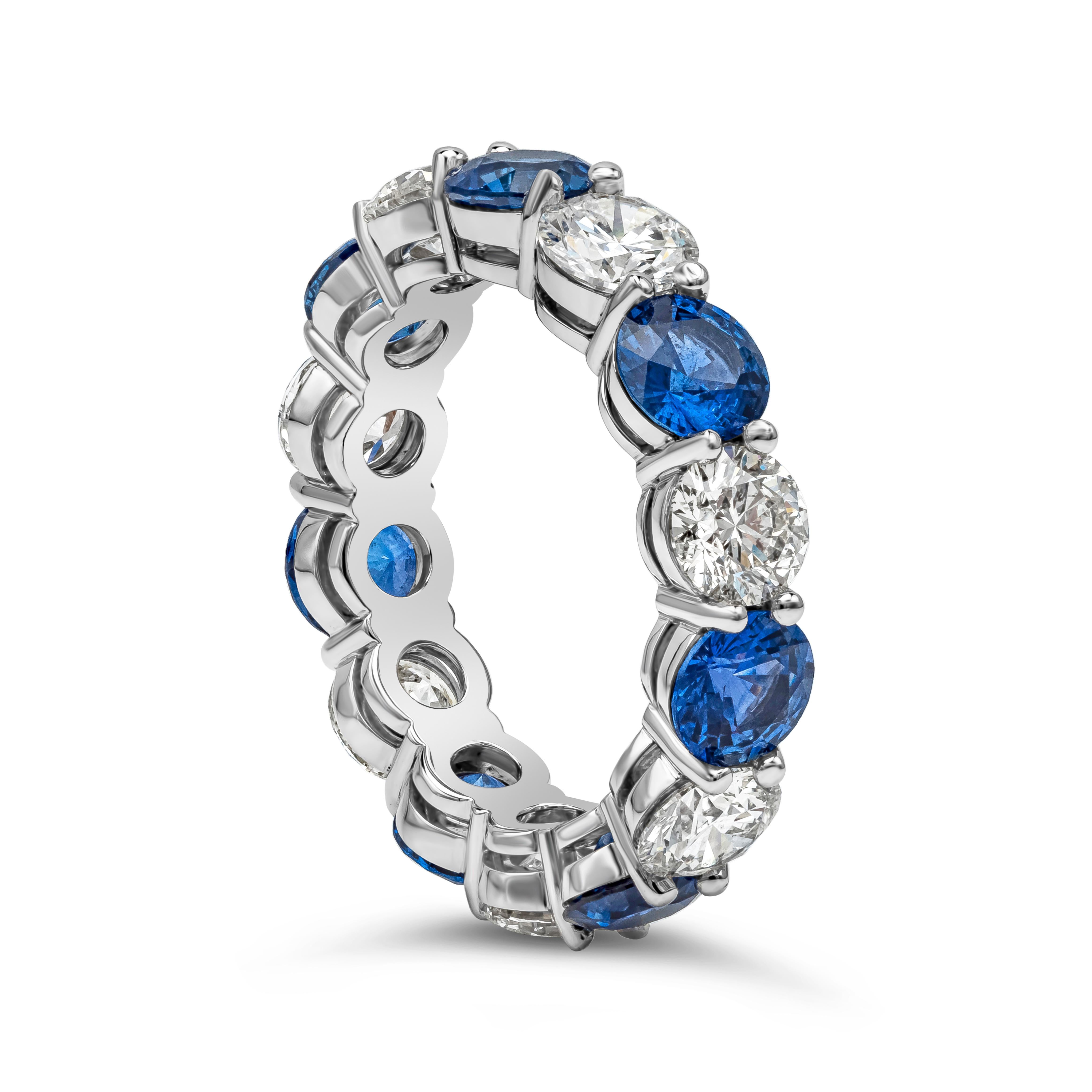 A classic eternity wedding band features a vibrant round blue sapphires weighing 4.03 carats total, elegantly alternates with round brilliant diamonds weighing 2.92 carats, G-H in Color and SI in Clarity, Set in a shared prong setting, Made in