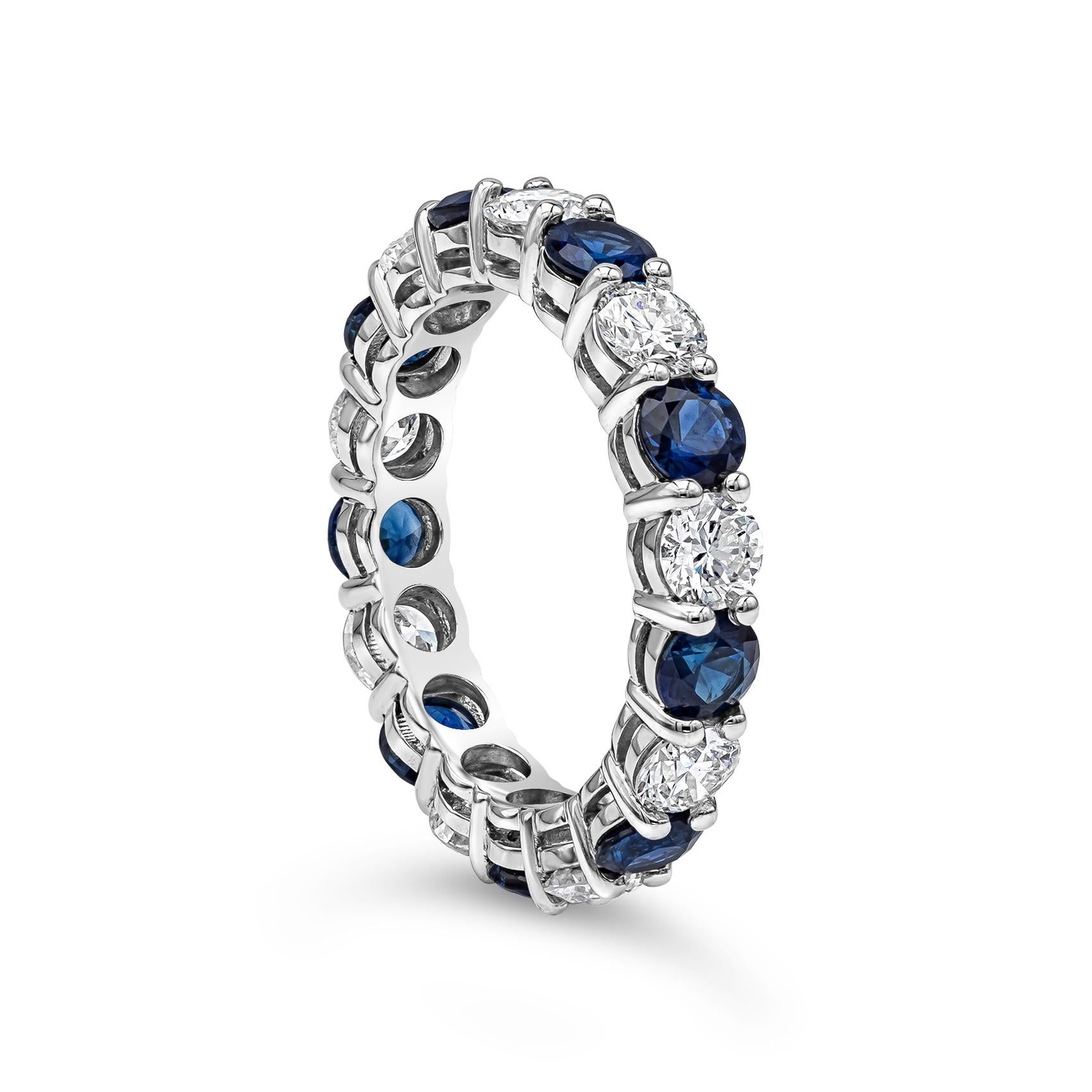 Ein klassischer Ehering für die Ewigkeit mit blauen Saphiren von 2,30 Karat, die sich elegant mit runden Brillanten von 1,89 Karat abwechseln. Montiert in einer geteilten Zackenfassung, gefertigt aus 18 Karat Weißgold. Größe 6 US

Roman Malakov ist