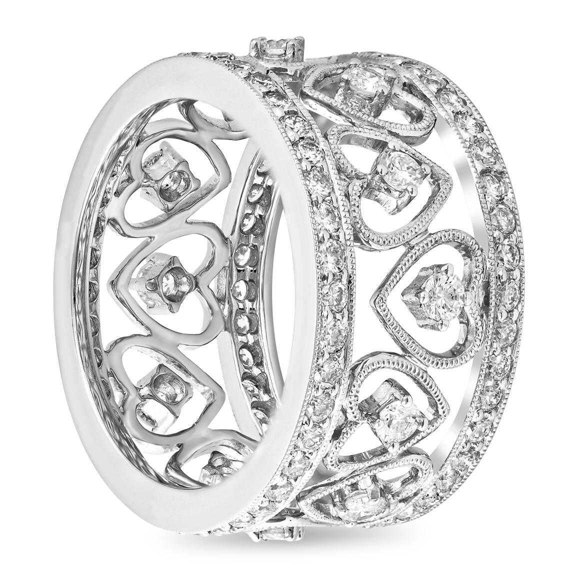 An intricately-designed and antique style eternity wedding band ring set with 1.61 carats total of brilliant round sparkling diamonds. The ring features open-hearts that elegantly encircle the 18K white gold composition, finished with milgrain edges