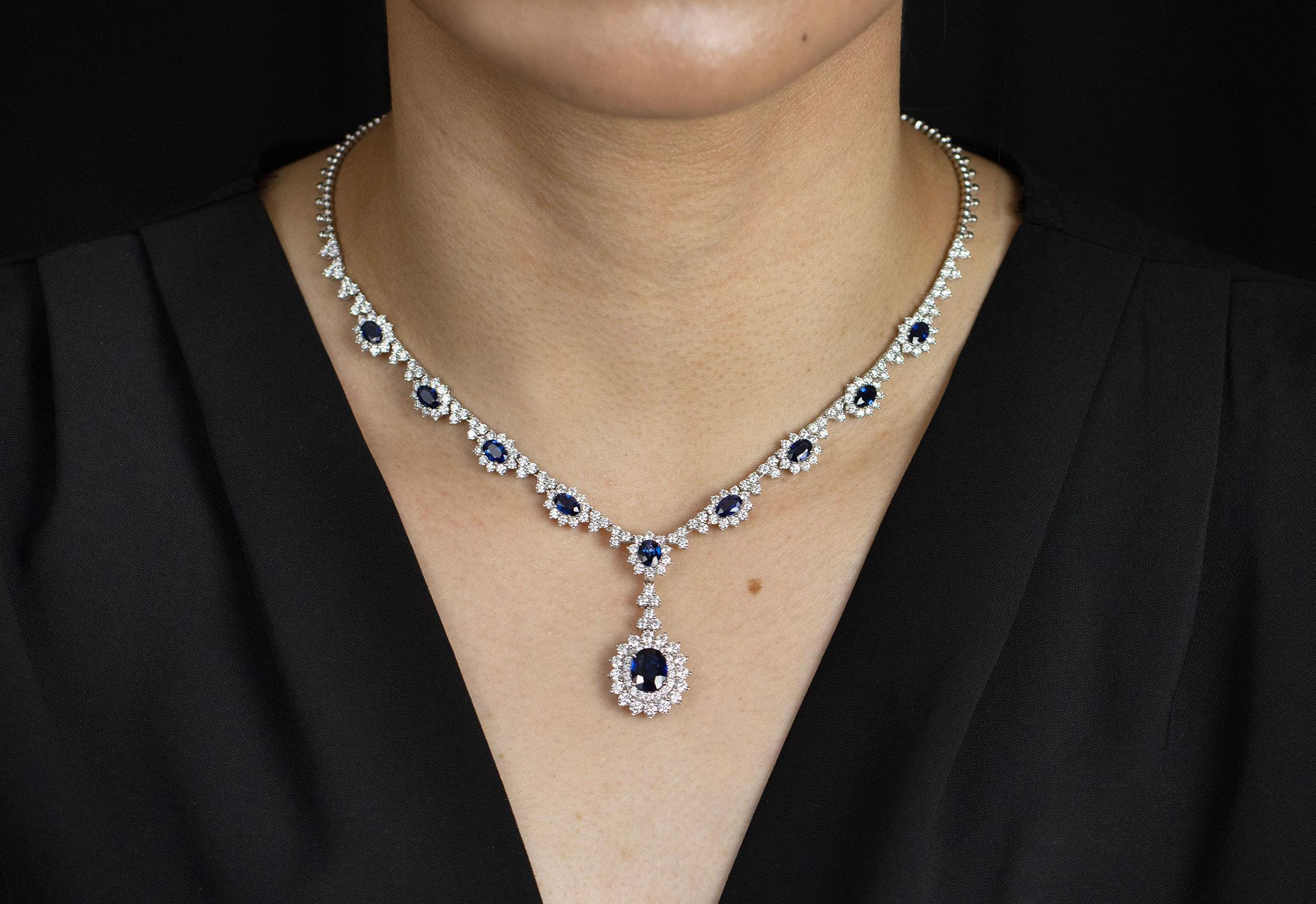 6.85 Carats Total Oval Cut Blue Sapphire and Round Diamond Halo Pendant Necklace In New Condition For Sale In New York, NY