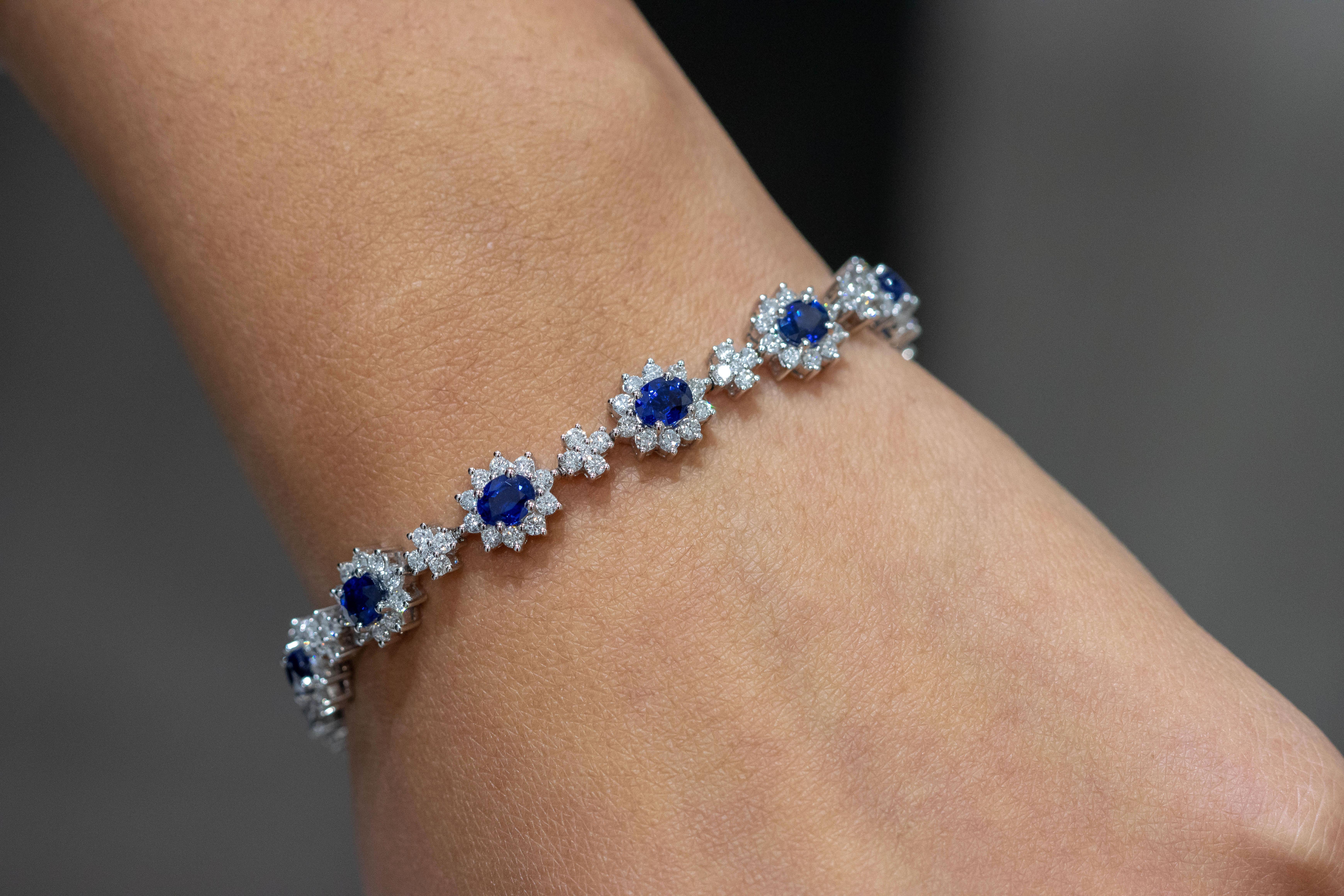 Contemporary Roman Malakov 6.64 Carat Oval Blue Sapphire with Diamond Halo Flower Bracelet For Sale