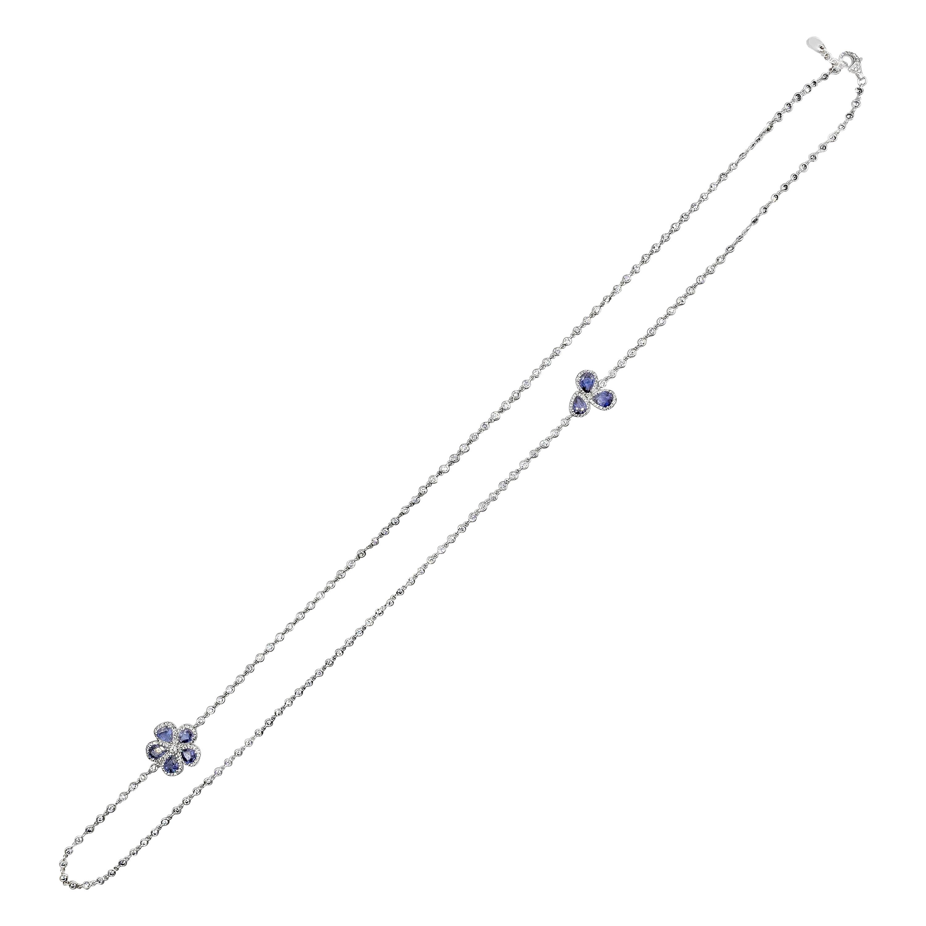 Lange Halskette mit 5,89 Karat blauem Saphir in Birnenform mit Diamant-Blumenmuster