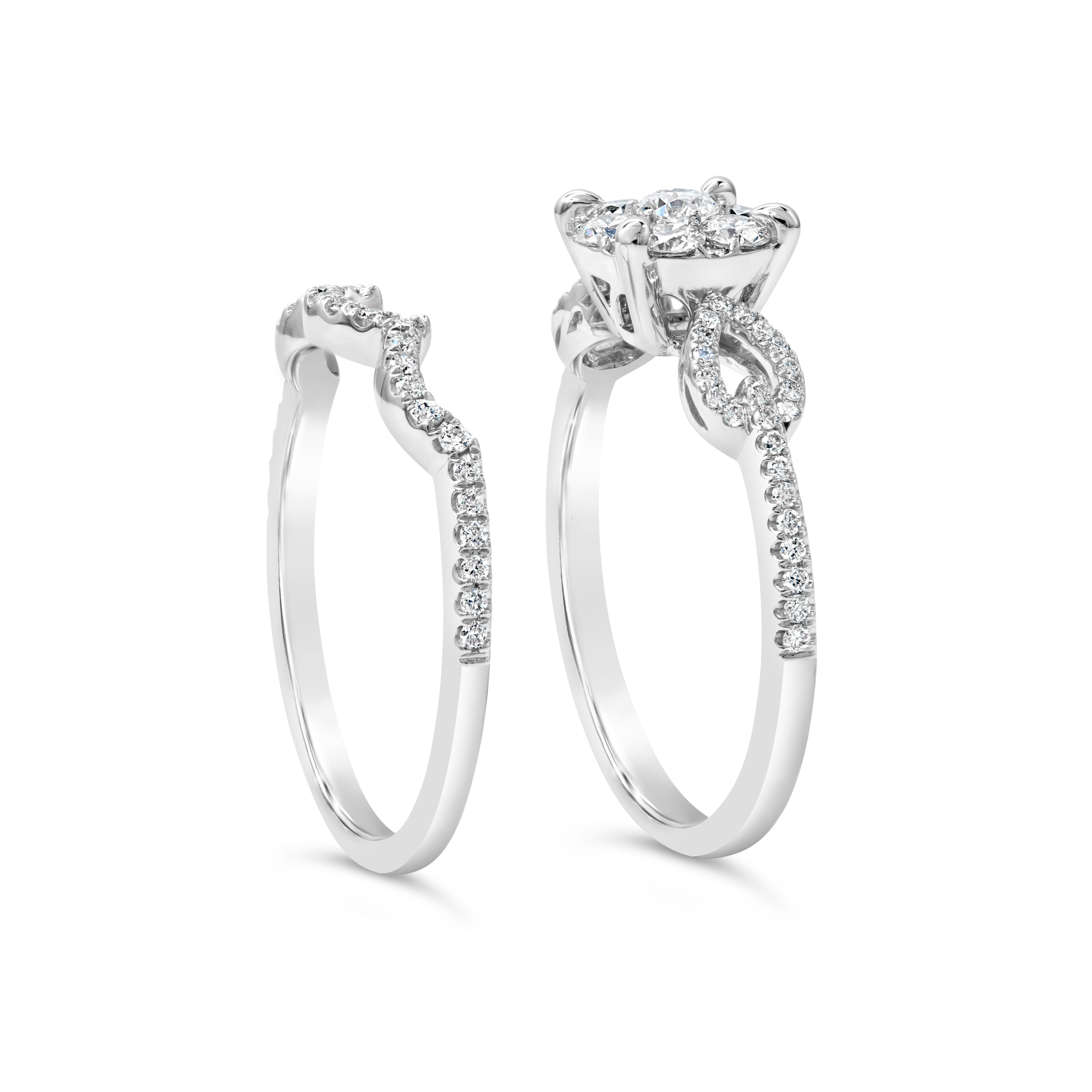 The engagement ring features a cluster of round brilliant diamonds, set in a brilliant diamond halo in a unique 14k white gold mounting. Diamonds weigh 0.56 carats total.The wedding band features a curved style set with diamonds for a seamless fit