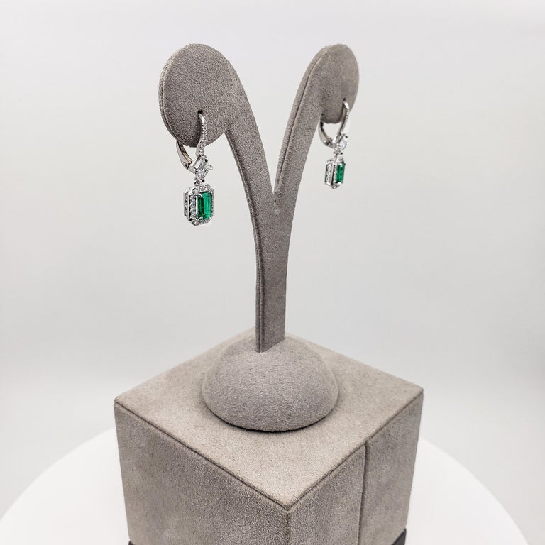 Women's Roman Malakov Colombian Emerald and Diamond Halo Dangle Earrings For Sale