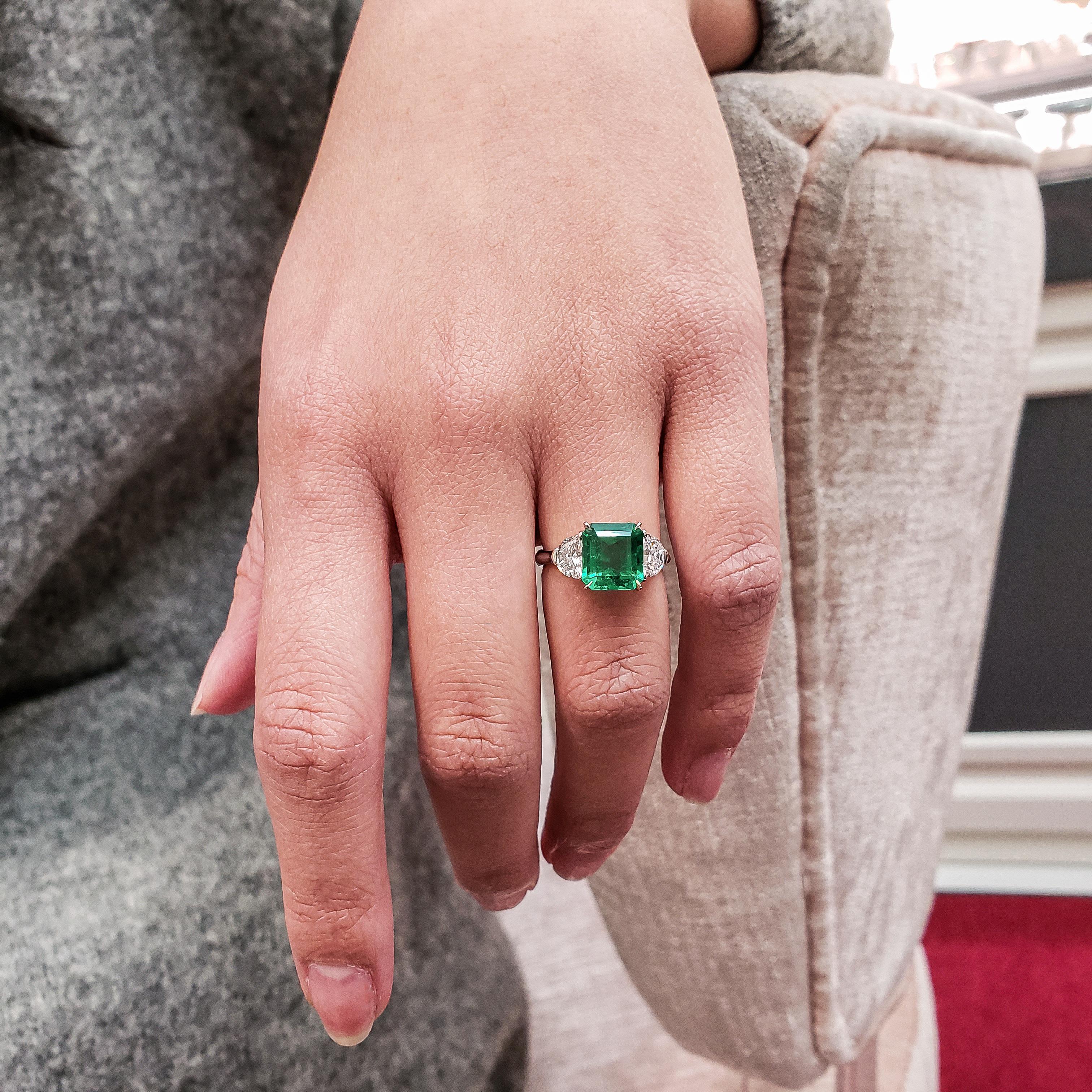 Contemporary 2.77 Carat Colombian Green Emerald and Diamond Three-Stone Engagement Ring