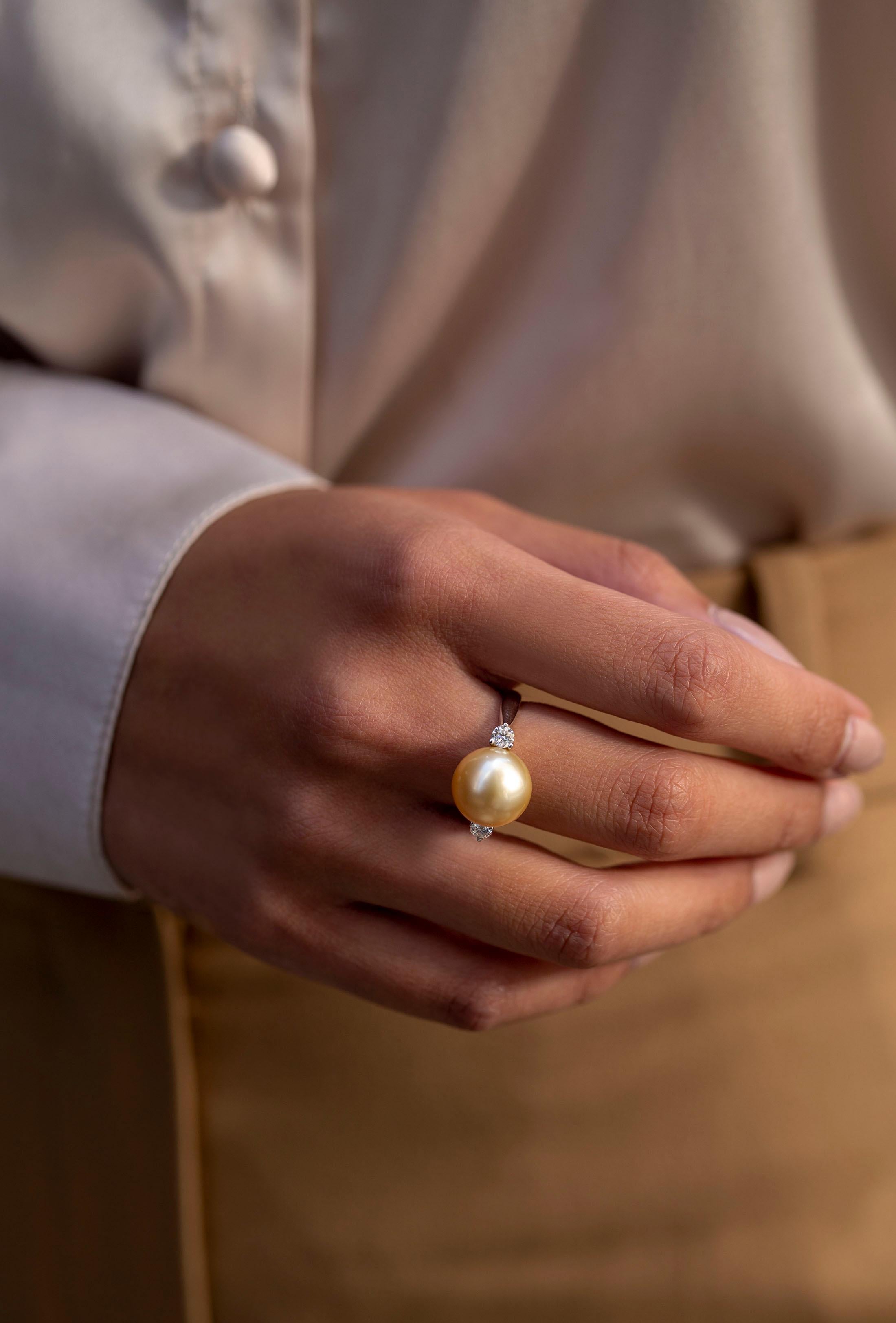 diamond ring with pearl side stones