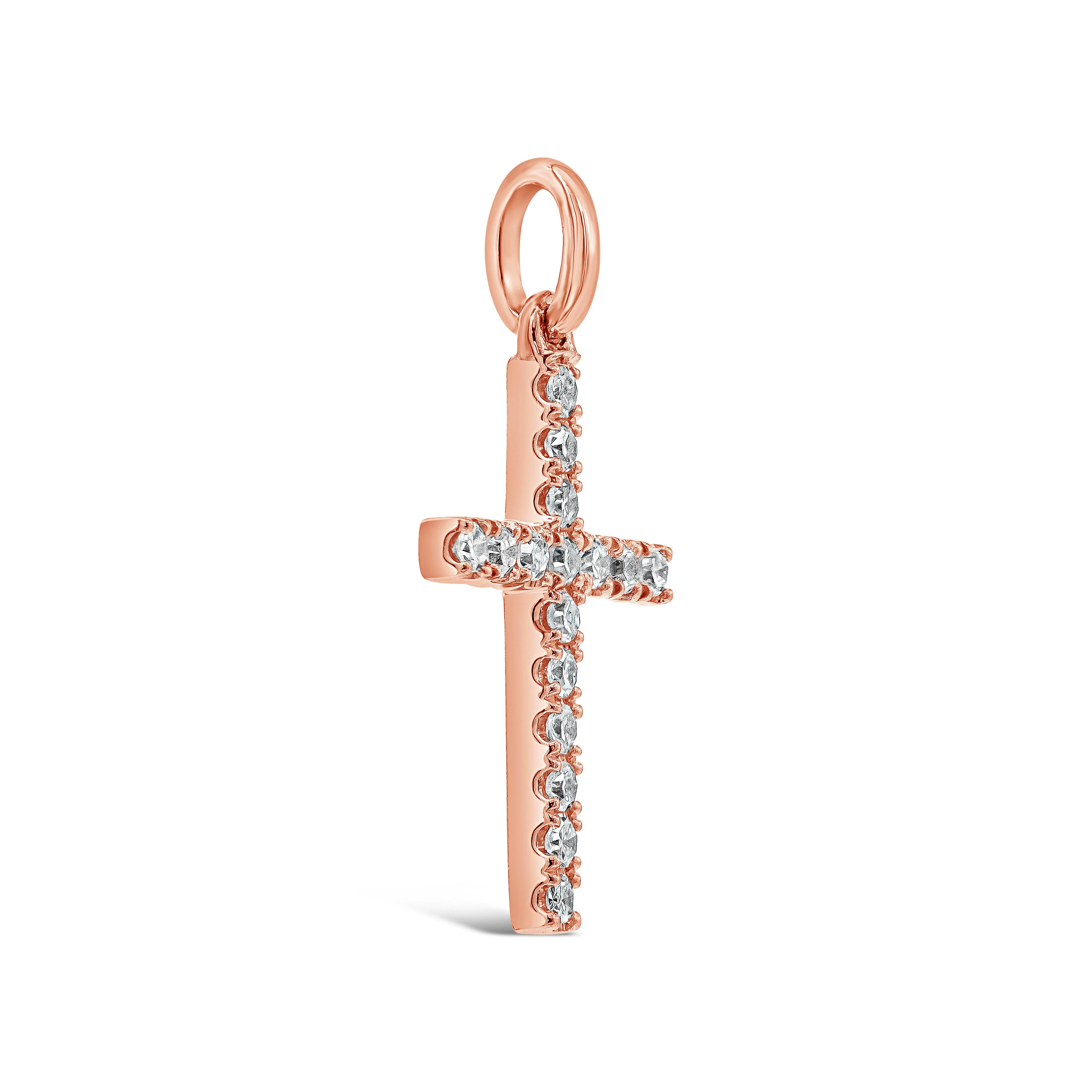 A small pendant necklace showcasing 0.08 carats total of single cut diamonds, set in a religious cross design. Made in 18k rose gold. Suspended in an 16 inch rose gold chain.

Style available in different price ranges. Prices are based on your