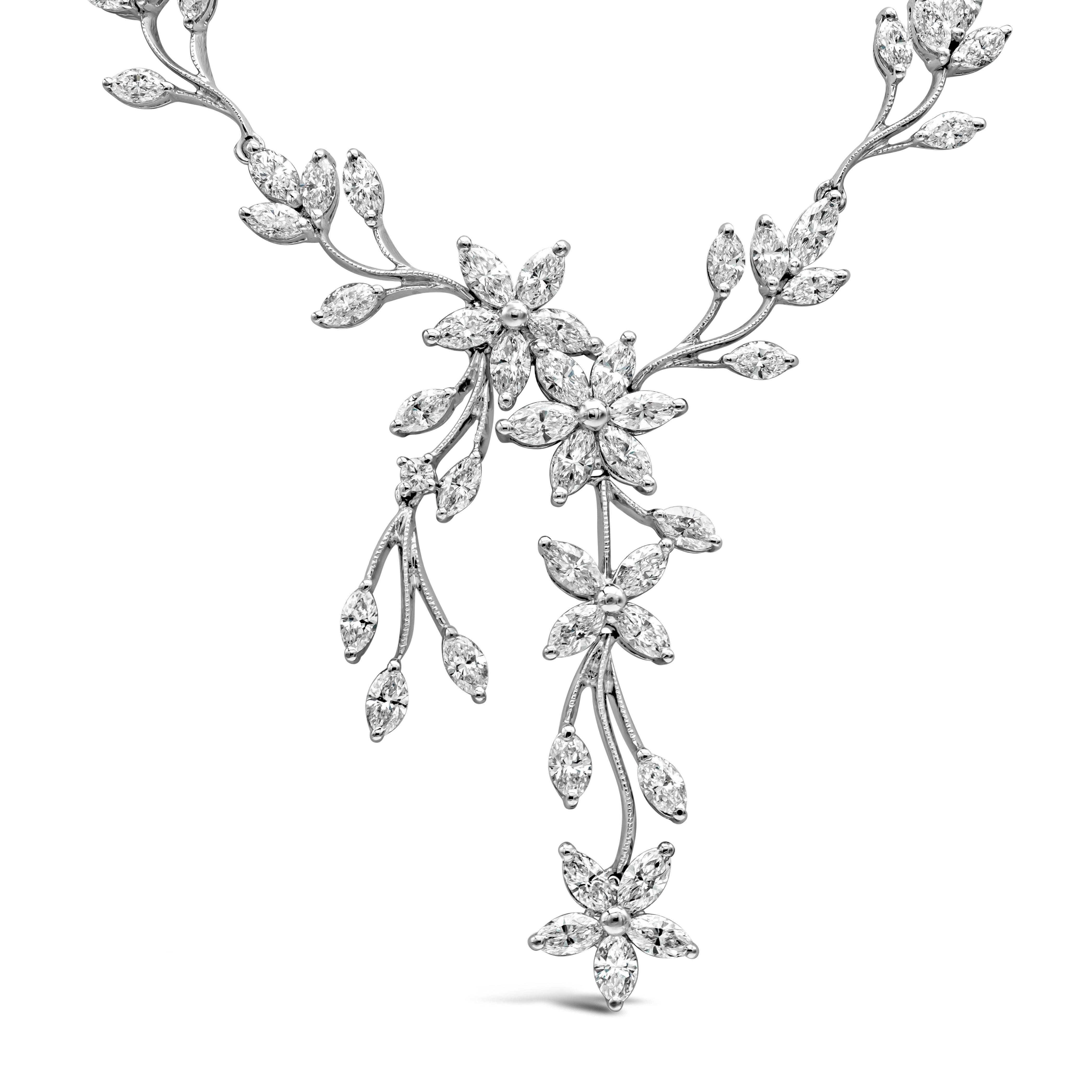 A chic and fashionable drop necklace made up of 69 marquise cut diamonds arranged in the shape of a flower-motif design. Diamonds weigh approximately 7.03 carats total, G color and SI1 clarity. Set in 18K white gold and 16 inches in length.

Style